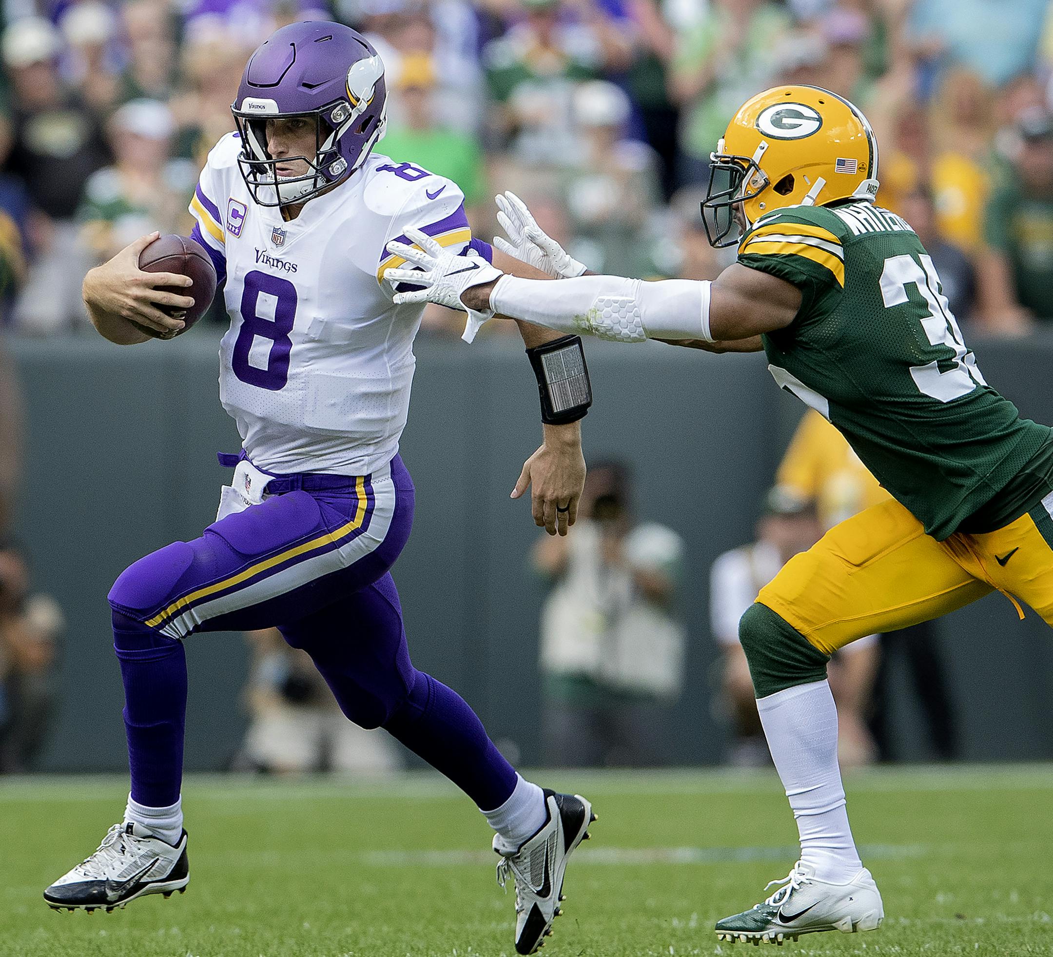Vikings quarterback Kirk Cousins scrambled out of the pocket in the fourth quarter. ] CARLOS GONZALEZ &#xef; cgonzalez@startribune.com &#xf1; September 16, 2018, Green Bay, WI, Lambeau Field, NFL, Minnesota Vikings vs. Green bay Packers