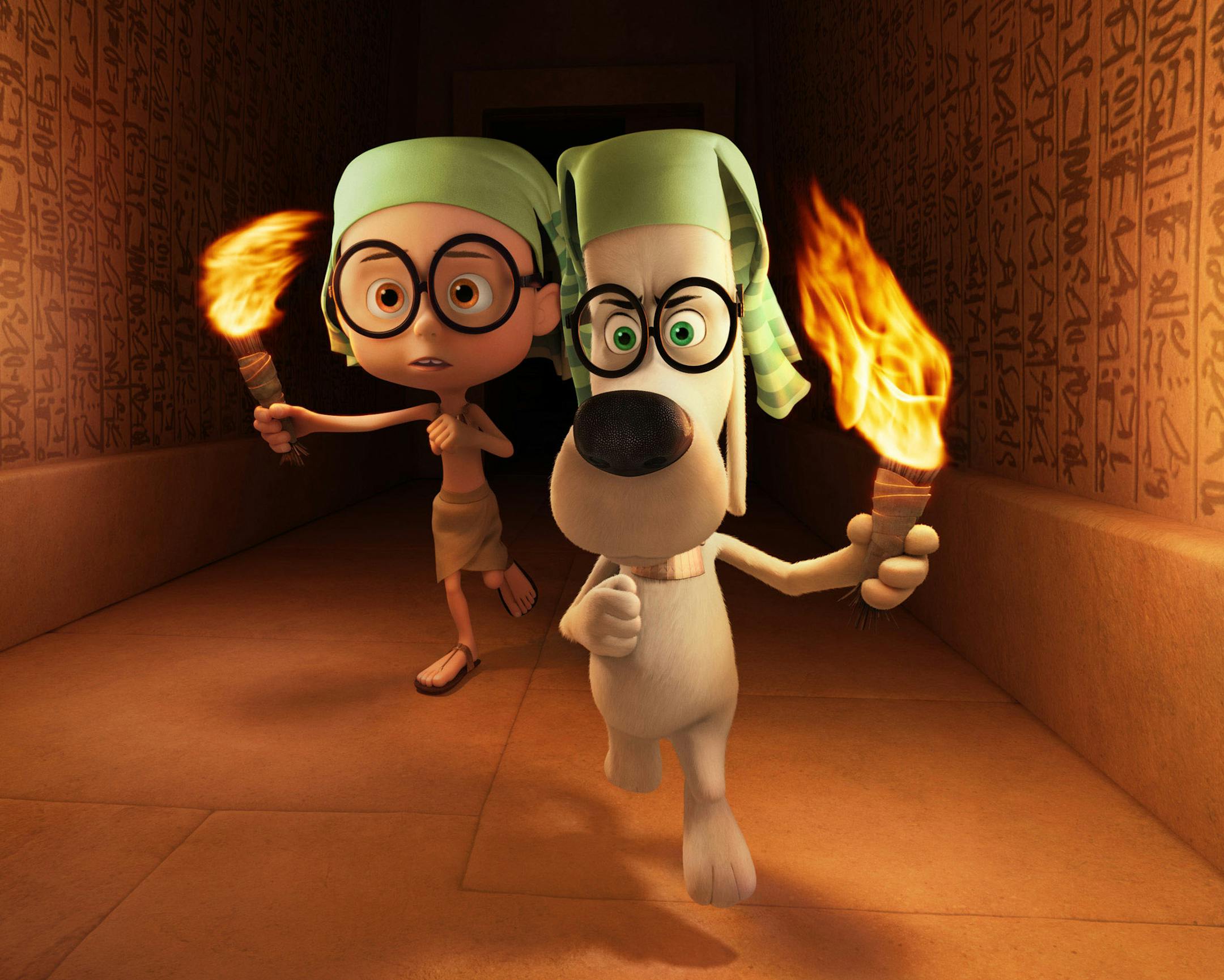 This image released by DreamWorks Animation shows Sherman, voiced by Max Charles, left, and Mr. Peabody, voiced by Ty Burell, in a scene from "Mr Peabody & Sherman." (AP Photo/ DreamWorks Animation)