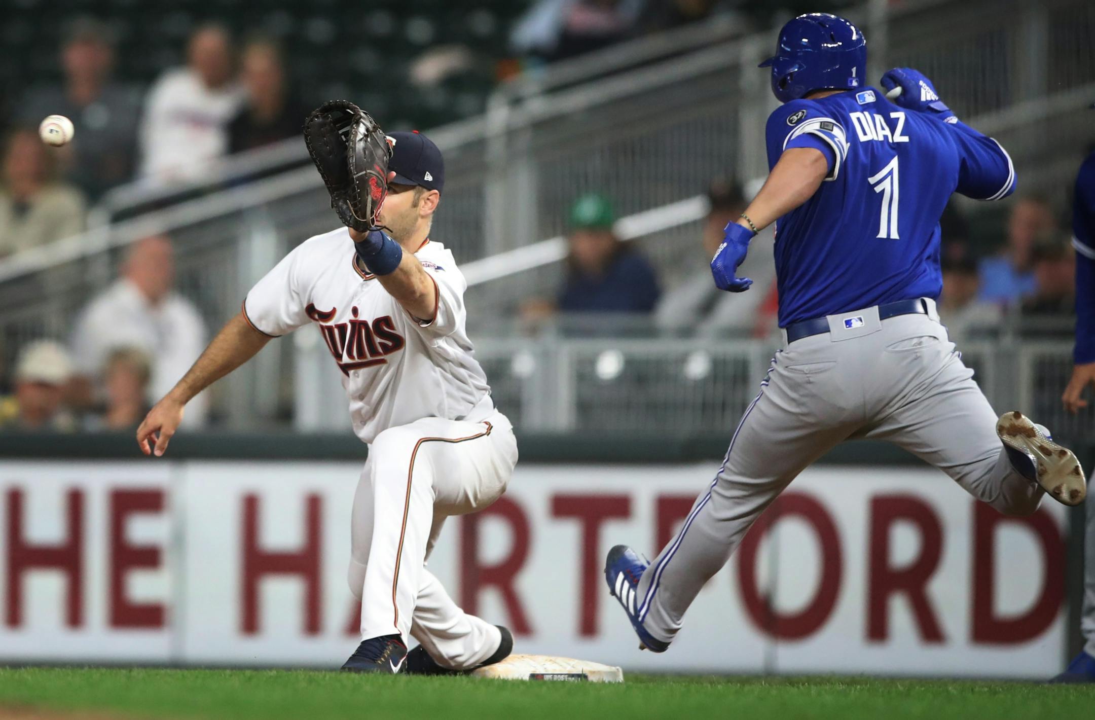Blue Jays Aledmys Diaz grounded out at first base , as Twins Joe Mauer made the play in the ninth inning at Target Field Tuesday May 1, 2018.
