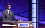Aaron Rodgers at the lectern for his guest host stint on “Jeopardy!”