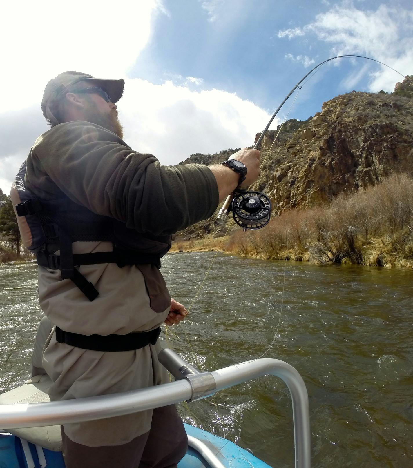 ADVANCD FOR RELEASE SATURDAY, APRIL 12, 2014, AND THEREAFTER- In this April 4, 2014 photo, fly fishing guide Greg Felt, of ArkAnglers, samples a segment of the freshly minted Gold Medal trout fishing water through Bighorn Sheep Canyon on the Arkansas River in Salida, Colo. Colorado Parks and Wildlife proclaimed a full 102-mile segment of the upper Arkansas among the state's elite trout fisheries last winter. (AP Photo/The Denver Post, Scott Willoughby) MAGS OUT; TV OUT; INTERNET OUT; NO SALES; N