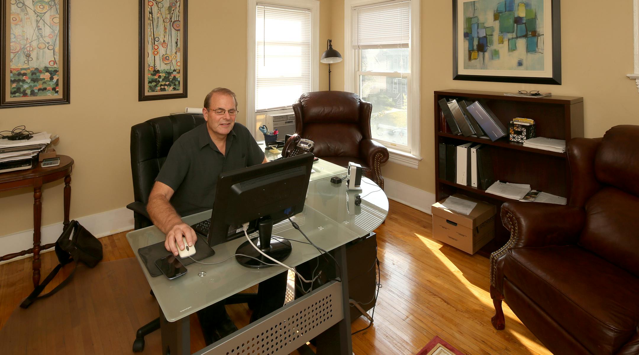 Structural engineer Tom Irmiter, who last month purchased an historic 1885 home on Selby Avenue in St. Paul, MN. September 04, 2013. ] JOELKOYAMA&#x201a;&#xc4;&#xa2;joel koyama@startribune Structural engineer Tom Irmiter, who last month purchased an historic 1885 home on Selby Avenue in St. Paul and is using it as offices for his eight-employee business, Forensic Building Science. Irmiter, a former builder who has renovated many older homes in St. Paul, now heads a business whose specialty is de
