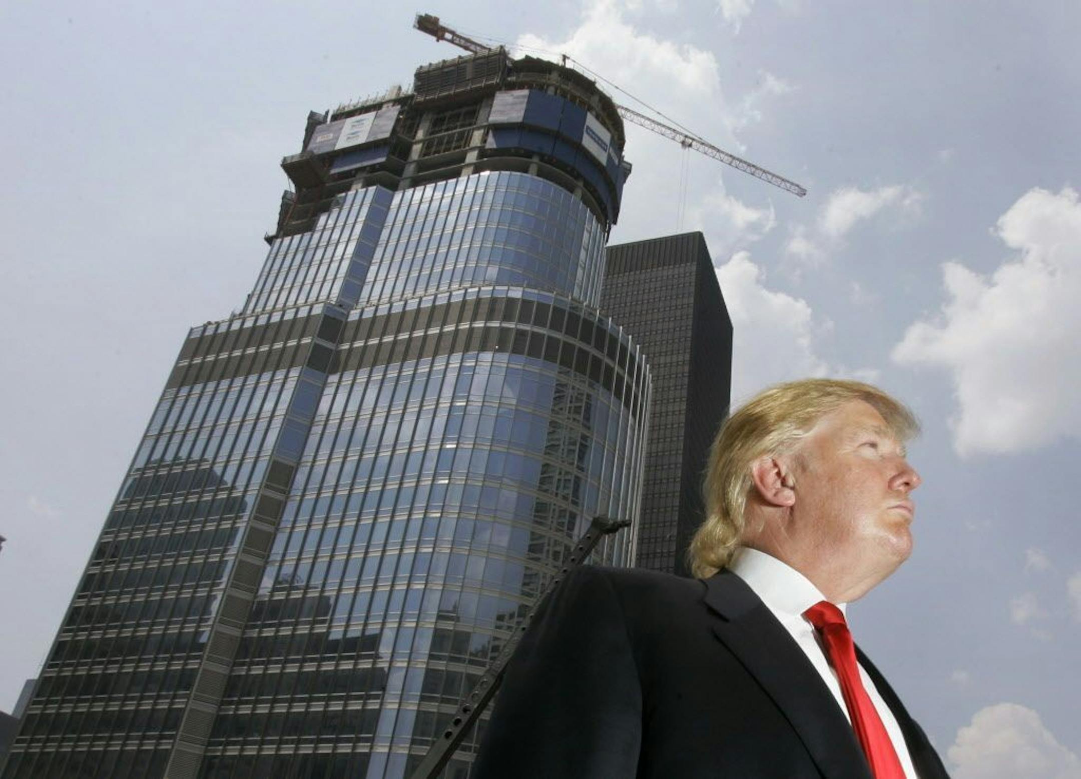 President Trump, shown here as his Trump International Hotel & Tower in Chicago was under construction in 2007, has lost the business of many pro sports teams since he began running for president.