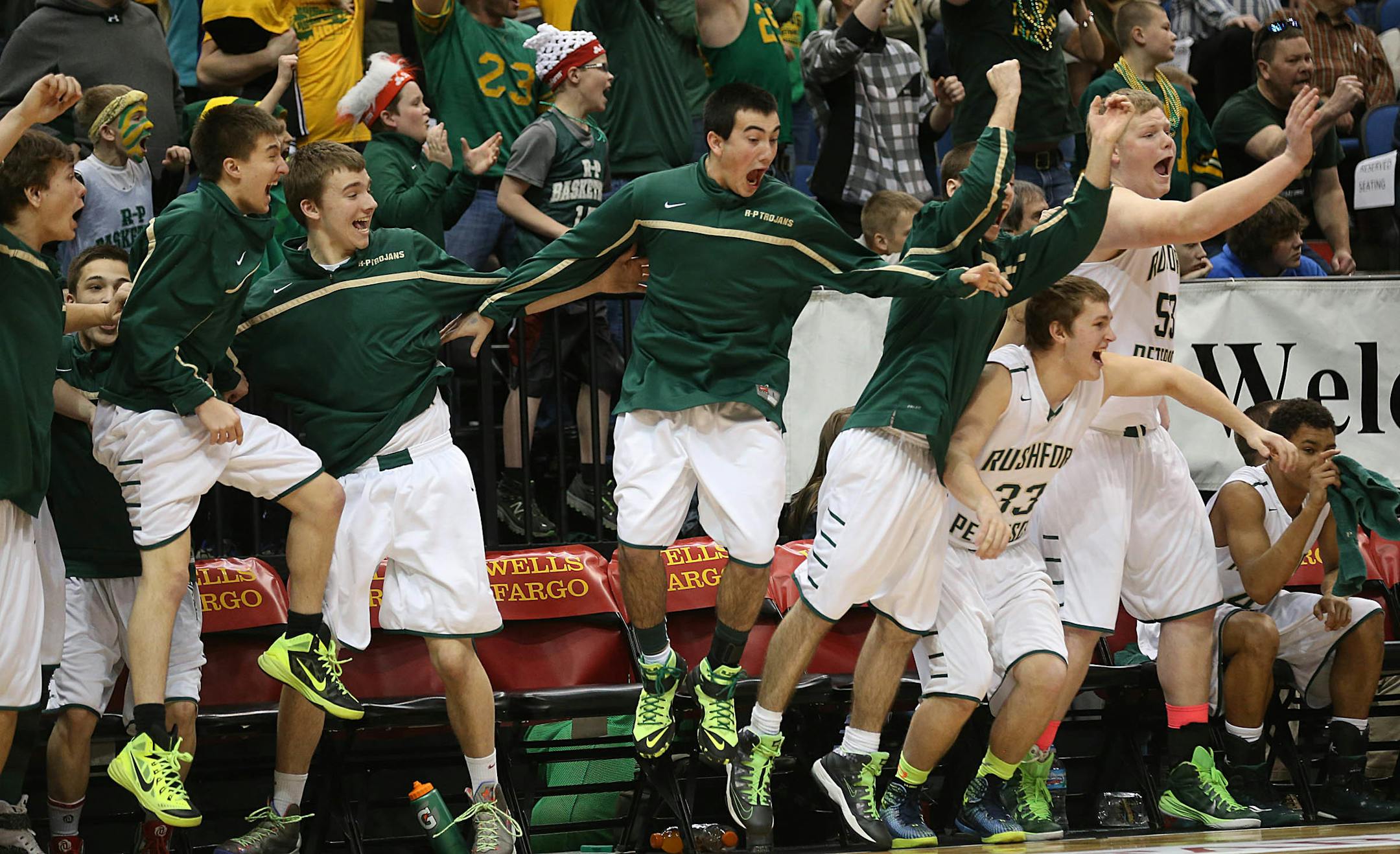 Rushford-Peterson players reacted at the end of the game and a 51-44 victory over Maranatha Christian Academy to win the Class 1A Championship.