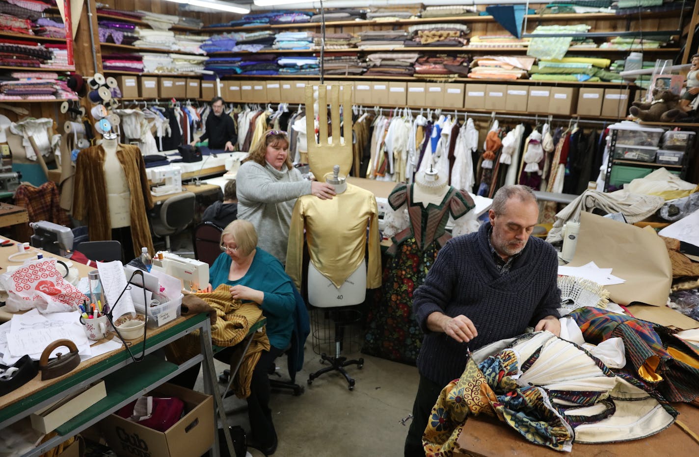 The Chanhassen costume shop, led by Hamson (right), was humming in preparation for this week&#x2019;s opening.