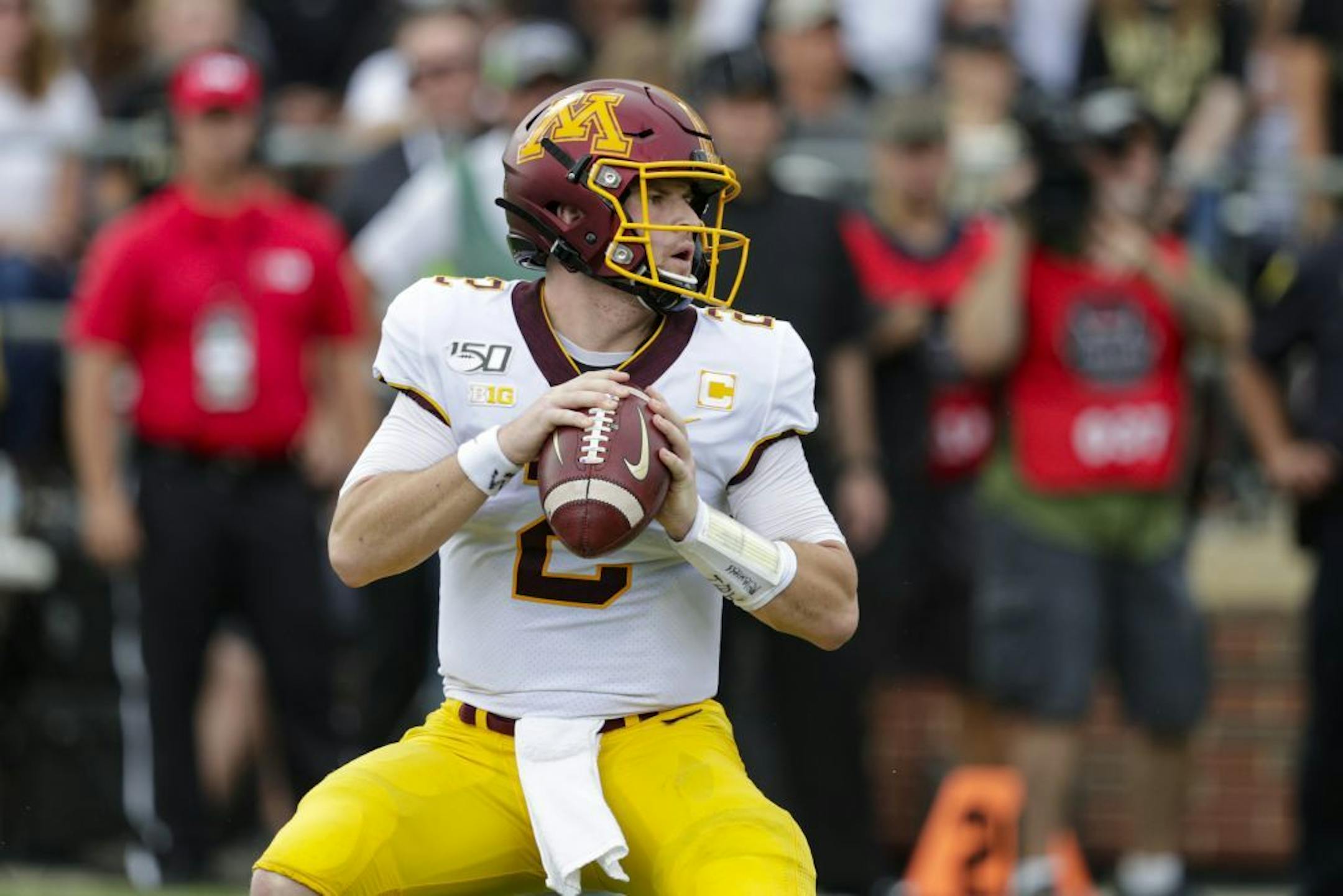 Minnesota quarterback Tanner Morgan (2) throws against Purdue during the first half of an NCAA college football game in West Lafayette, Ind., Saturday, Sept. 28, 2019.