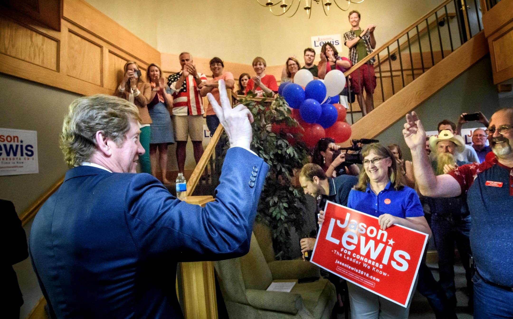 Republican primary candidate Jason Lewis flashed the victory sign to the cheers of supporters in his Burnsville campaign headquarters just after the polls closed. He is running against three other Republicans for John Kline's Congressional seat in the second congressional district. The winner of this primary will run against Democrat Angie Craig.