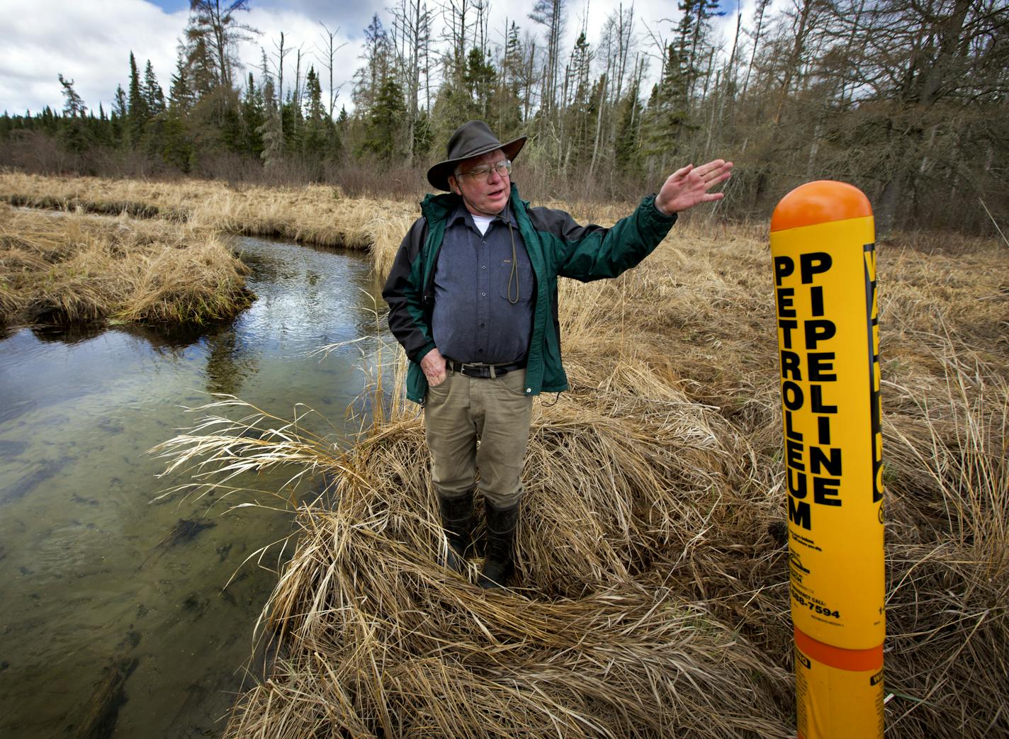 Former DNR scientist Paul Stolen shows some of the sensitive wetland areas along La Salle creek north of Itasca State Park.