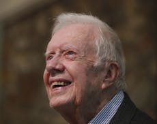 FILE - In this June 9, 2019 file photo, former President Jimmy Carter smiles as he returns to Maranatha Baptist Church to teach Sunday School, less th