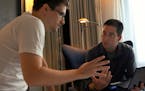 In this image released by Radius TWC, Edward Snowden, left, appears with Glenn Greenwald in a scene from "Citizenfour," a documentary that intimately 