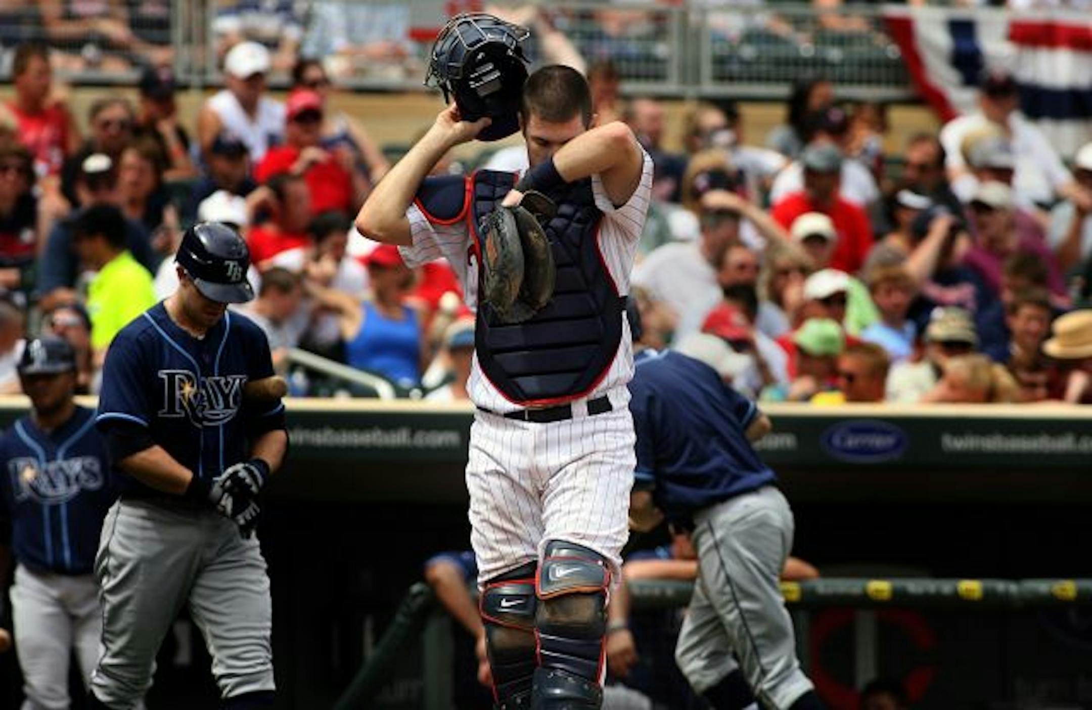 After batting .365 with 28 home runs and 96 RBI last season, Joe Mauer has seen his 2010 numbers drop to .293 with four homers and 35 RBI.