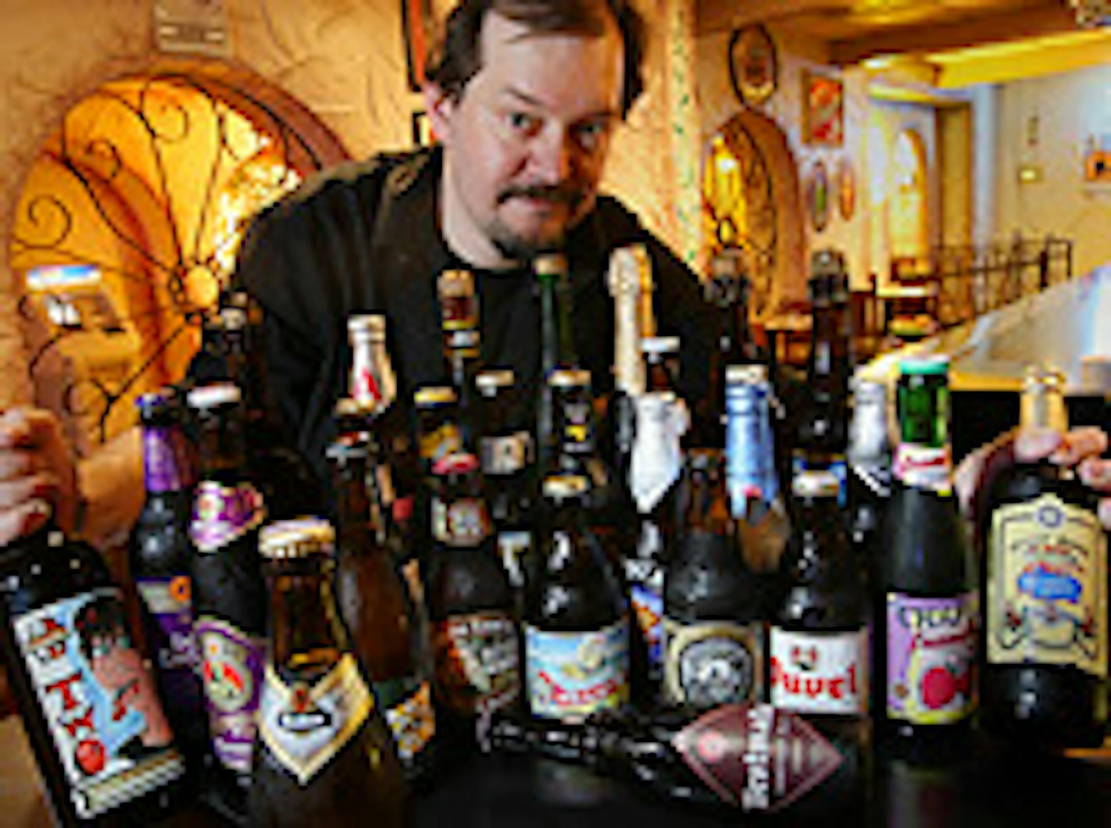Al McCarty offers about 50 different bottled beers at the Blue Nile