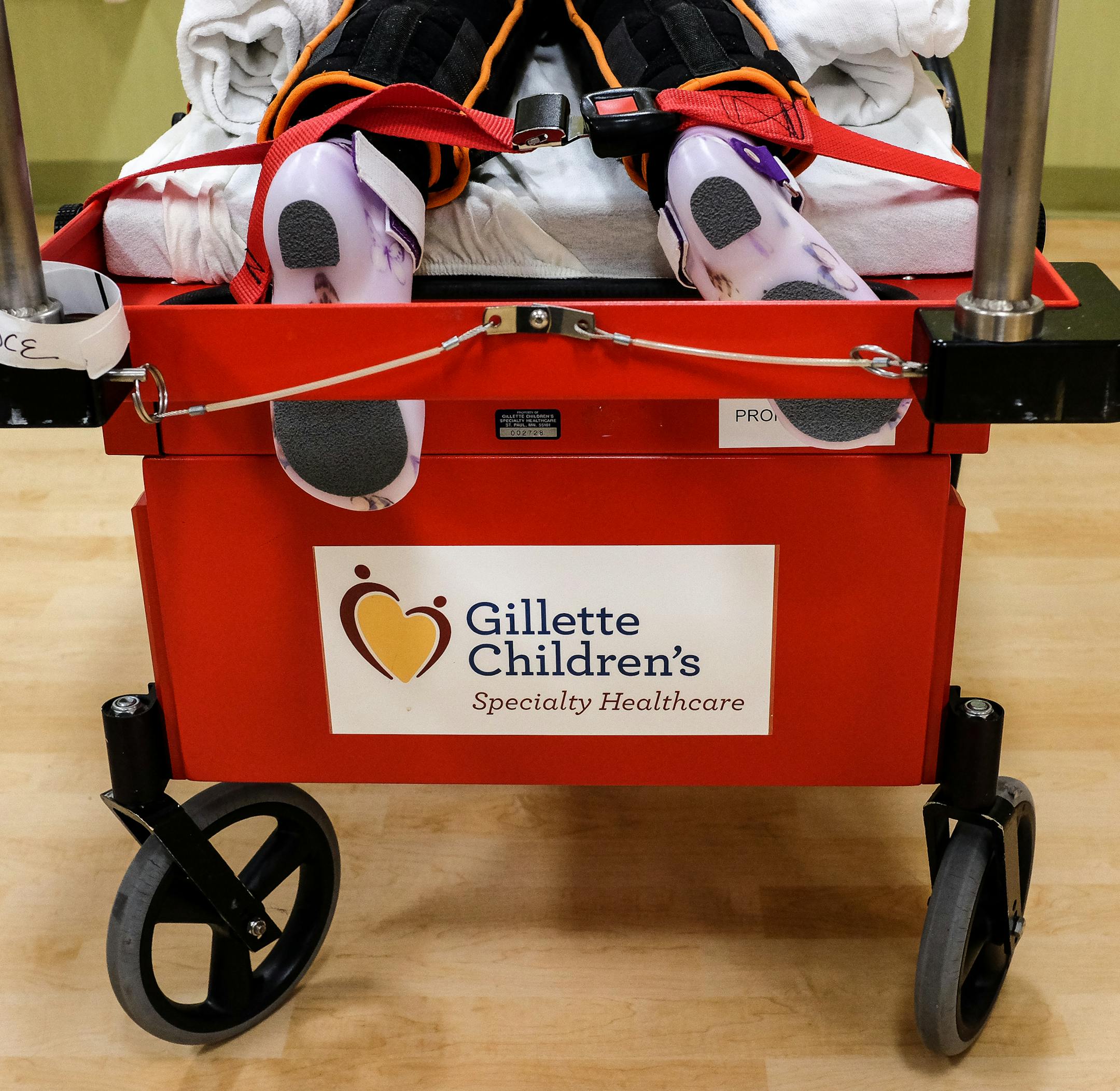Patience Wheaton uses a prone cart that was designed for young patients with severe spasticity, to improve healing after a difficult surgery known as a selective dorsal rhizotomy. The carts were conceived, tested and patented by Gillette.