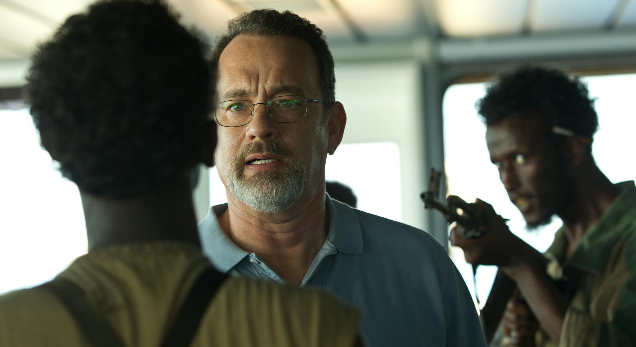This film image released by Sony - Columbia Pictures shows Tom Hanks, center, in a scene from "Captain Phillips." The film was nominated for an Academy Award for best picture on Thursday, Jan. 16, 2014. The 86th Academy Awards will be held on March 2. (AP Photo/Sony - Columbia Pictures)