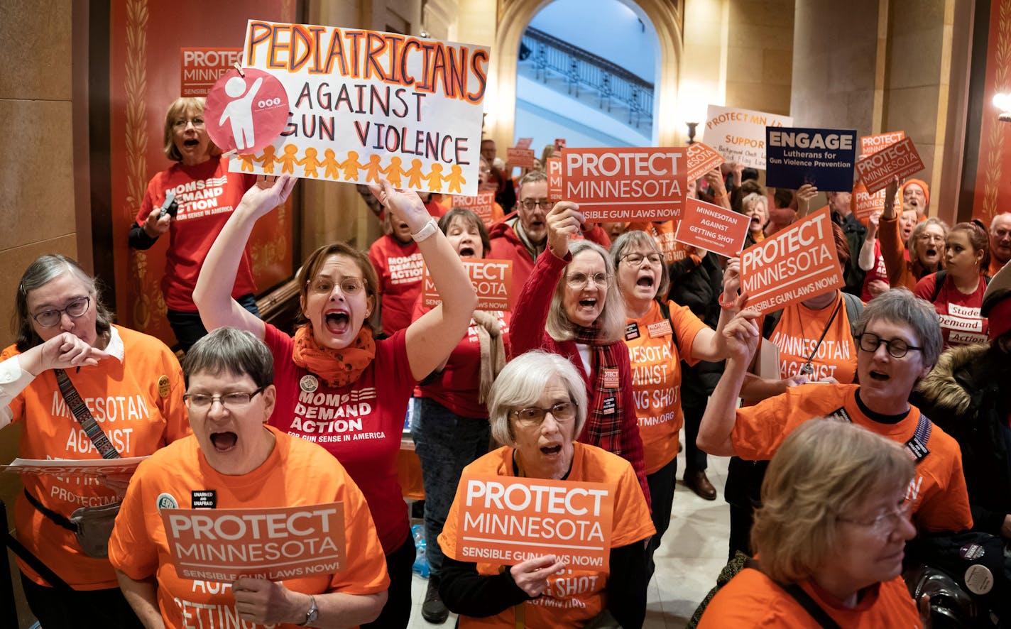 Gun safety advocates from Protect Minnesota and Moms Demand Action chanted and cheered on DFL legislators who plan to vote for bills today that would expand background checks and a new red flag law. ] GLEN STUBBE &#x2022; glen.stubbe@startribune.com Thursday, February 27, 2020 The Minnesota House is expected to pass two gun control bills -- expanding background checks and a new red flag proposal -- on Thursday. The two key DFL priorities have attracted counterproposals from Republican lawmakers