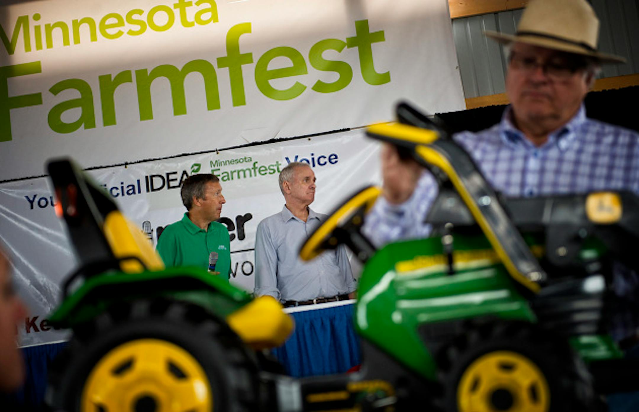 John Deere toy tractors were auctioned off for charity during breaks as Governor Dayton spoke on a radio show at Farmfest.   Governor Mark Dayton delivered the keynote speech at Farmfest the outstate agricultural trade show held each year at Gilfillian Estate in Redwood County, Minnesopta,  Thursday August 8, 2013   ]   GLEN STUBBE * gstubbe@startribune.com
