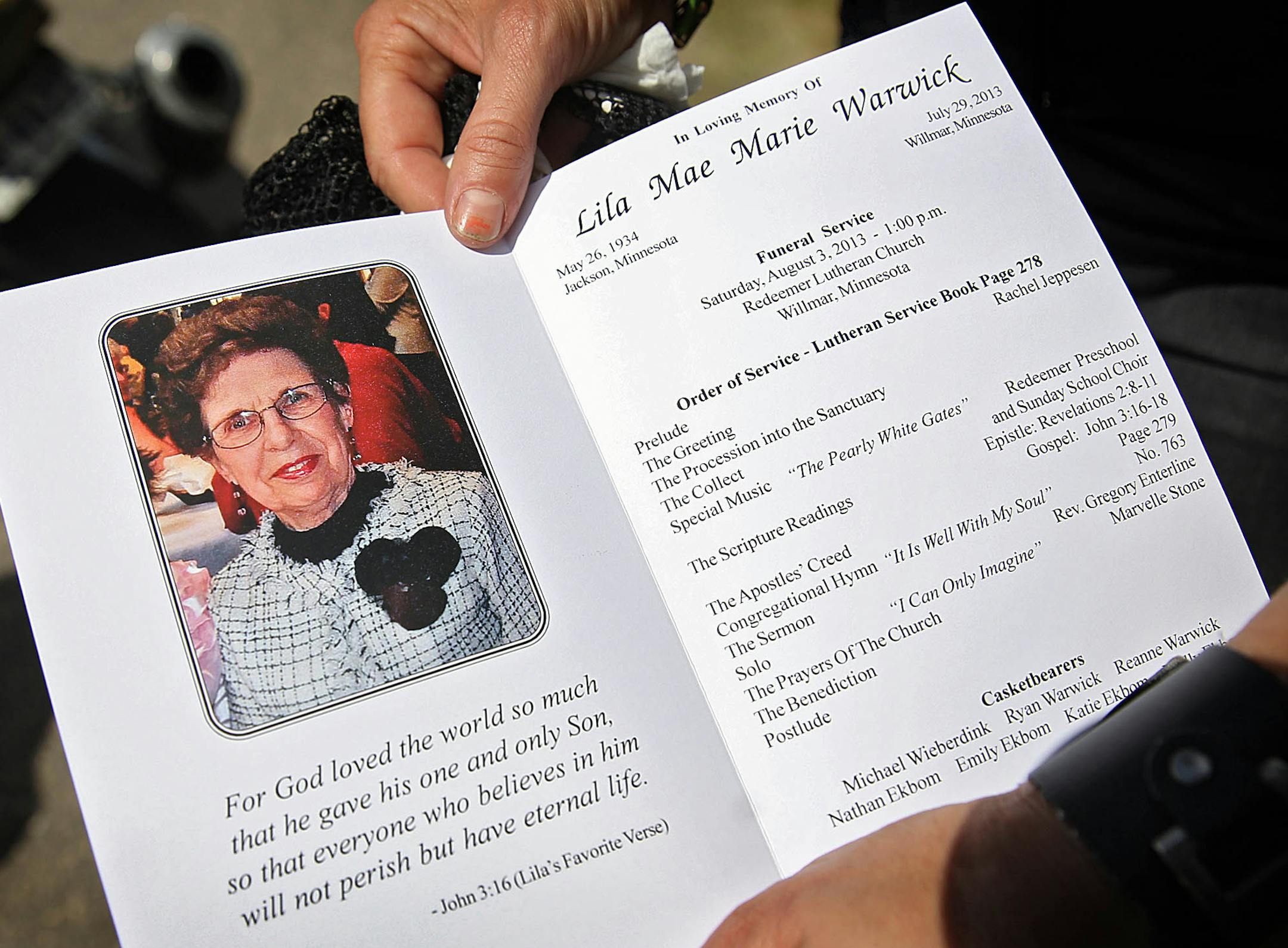 Anngel Schweiss, Bloomington, held a program from the funeral service. Schweiss said she was a friend of Lila Warwick. ] (JIM GEHRZ/STAR TRIBUNE) / August 3, 2013, Willmar, MN &#x201a;&#xc4;&#xec; BACKGROUND INFORMATION: A 79-year-old Willmar church volunteer, Lila Warwick, was killed in her home during an ambush robbery which, according to charges filed Friday, was plotted by her 17-year-old grandson, Robert Warwick. A funeral service was held for Warwick Saturday, August 3, at Redeemer Luthera