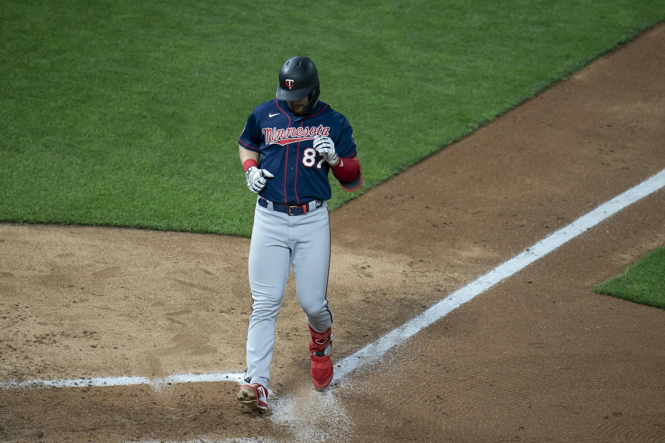 Minnesota Twins catcher Ryan Jeffers (87) ran home after hitting a home run during a scrimmage at practice at Target Field in Minneapolis, Minn., on Wednesday, July 15, 2020.
