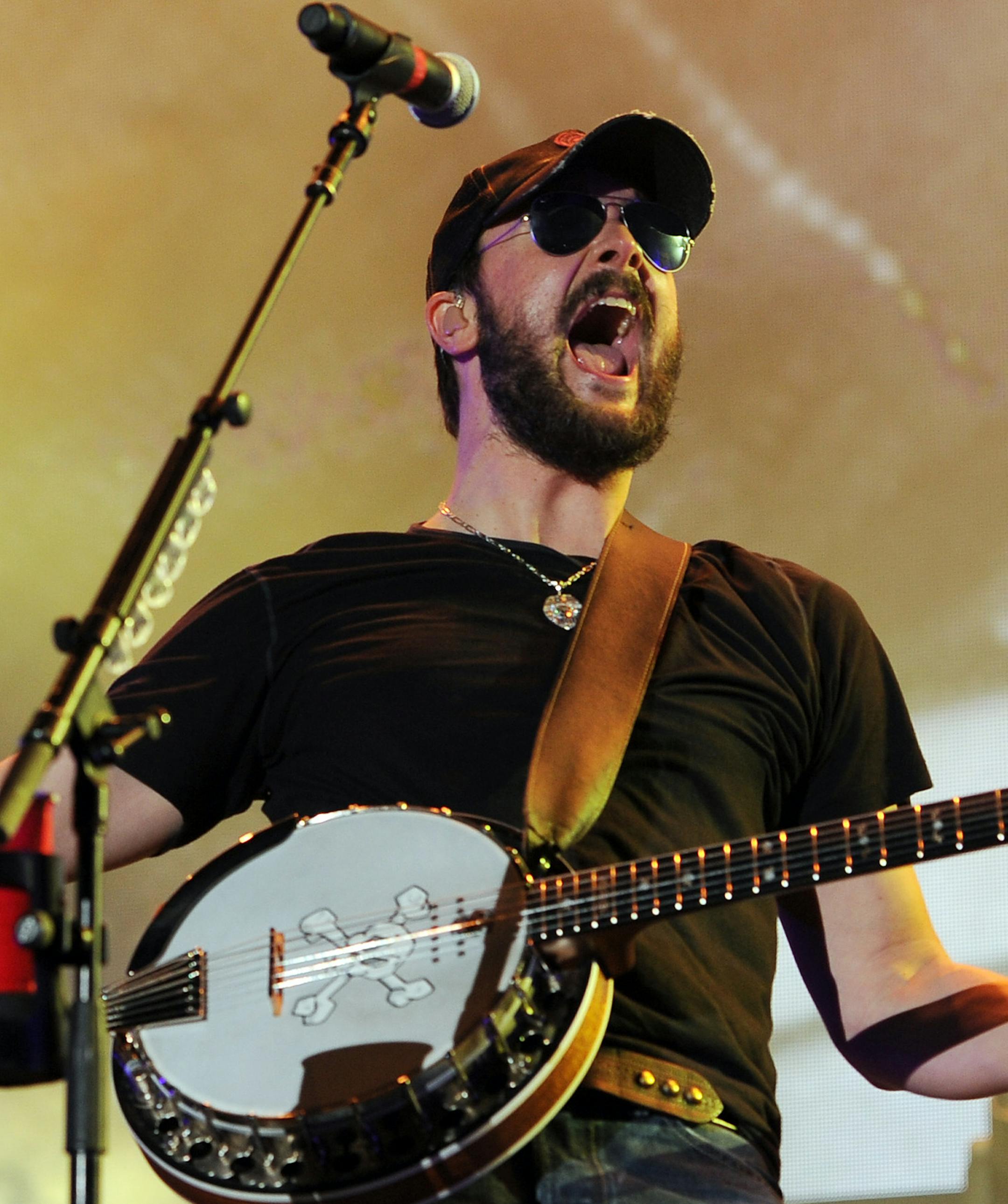 FILE - This April 14, 2013 file photo shows country singer Eric Church performing at the Tortuga Festival in Ft Lauderdale, Fla. Church, Luke Bryan and Miranda Lambert each received four nominations for the 2013 CMT Music Awards, on Monday, May 6. The awards show will air LIVE from the Bridgestone Arena in Nashville on Wednesday, June 5 at 8:00 p.m. EST. (Photo by Jeff Daly/Invision/AP, file) ORG XMIT: MIN2013060414135172