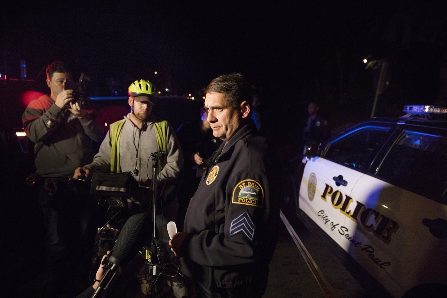 St. Paul Police department PIO Sgt. Mike Ernster holds a press conference on the scene.