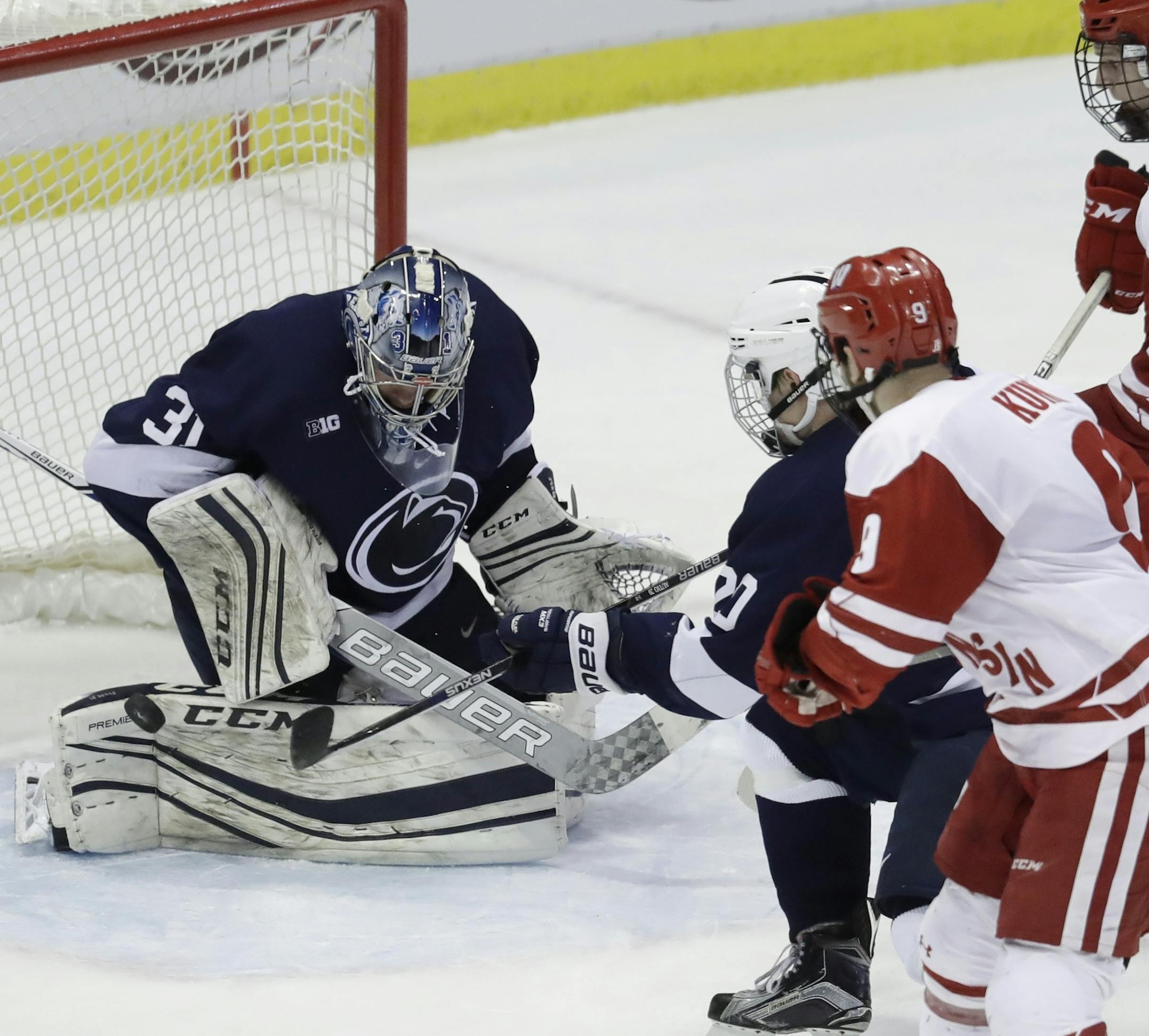 Penn State goalie Peyton Jones (31) deflects a shot during the second period of the final in the Big Ten college hockey tournament, Saturday, March 18, 2017, in Detroit. (AP Photo/Carlos Osorio)