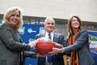 Governor Mark Dayton posed with Minnesota Super Bowl Hose Committee CEO Maureen Bausch, left and Minneapolis Final Four local organizing committee CEO