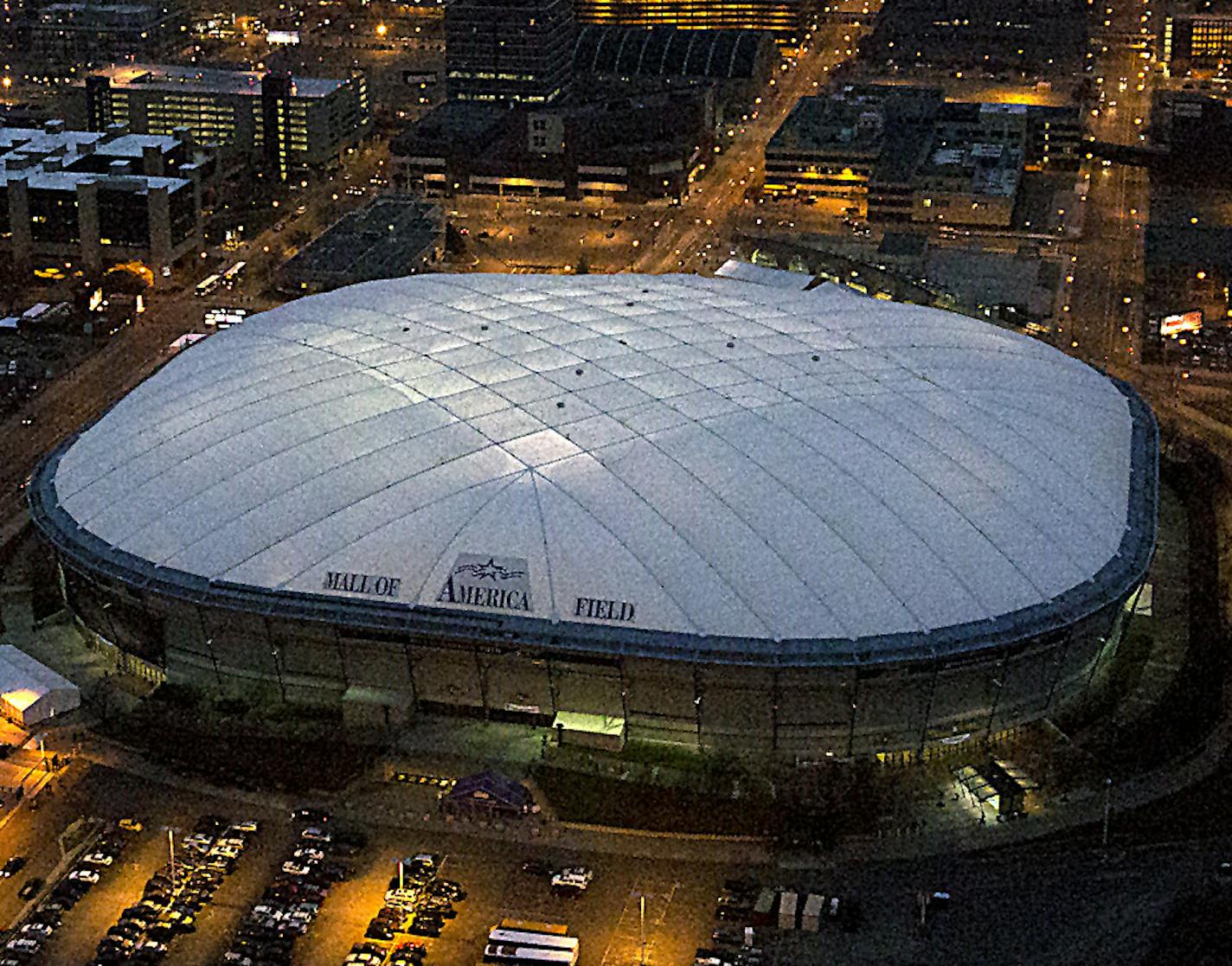 The Metrodome will soon be demolished in order to make way for the new Vikings, 65,000-seat stadium. ] JIM GEHRZ &#x201a;&#xc4;&#xa2; jgehrz@startribune.com / Minneapolis, MN / November 30, 2013 / 5:00 PM - BACKGROUND INFORMATION: Aerial photographs of downtown Minneapolis, taken November 30, 2013 as the sun set. Buildings in views of downtown include Capella Tower and US Bank Plaza.