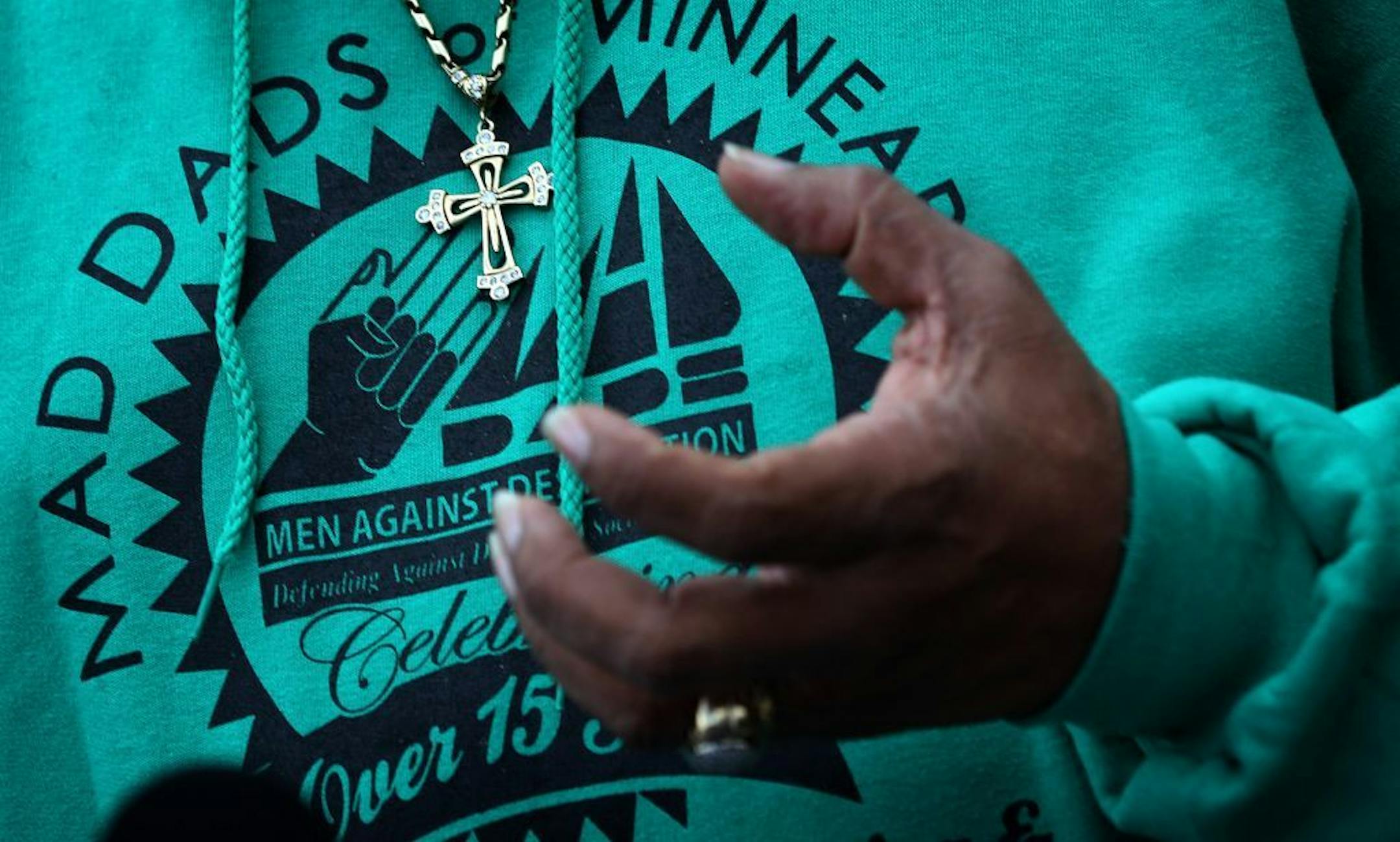 V.J. Smith, CEO and President of Minneapolis chapter of MAD DADS (Men Against Destruction, Defending Against Drugs and Social-Disorder) addressed members of the media outside the Minneapolis Police 4th.