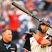 Nationals outfielder Eddie Rosario tosses his bat after hitting a go-ahead, two-run homer during the seventh inning against the Blue Jays on Sunday in