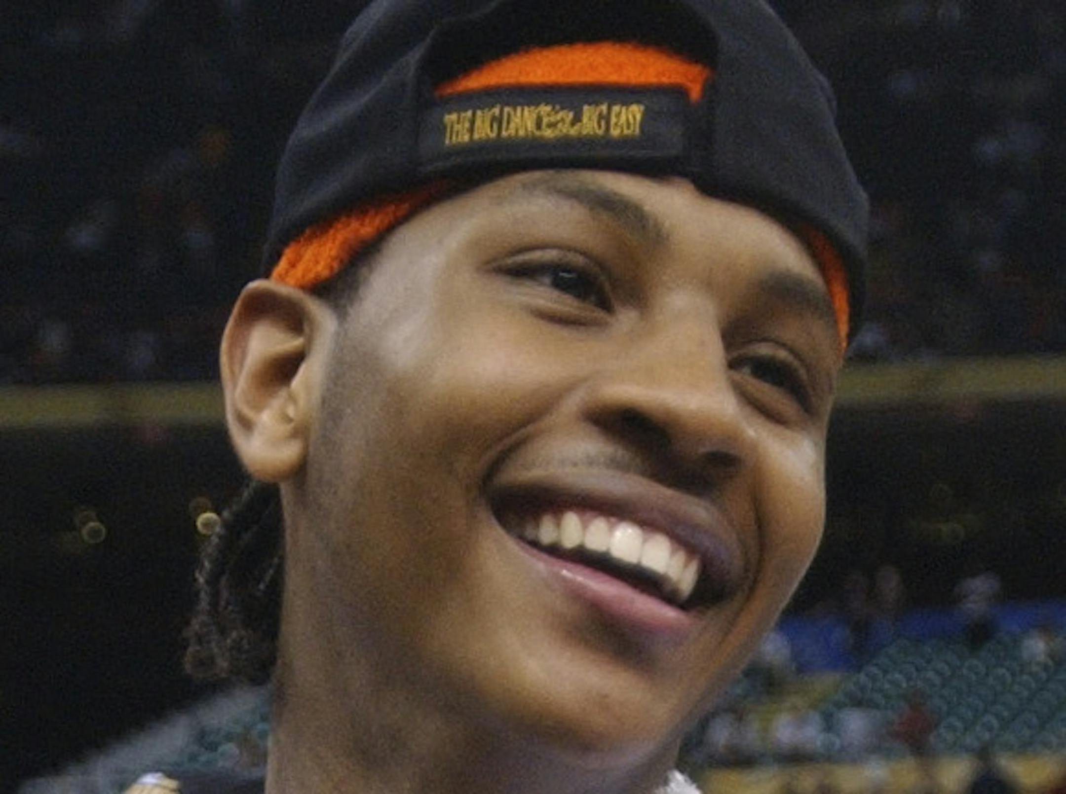 Syracuse's Carmelo Anthony holds the national championship trophy after the Orangemen beat Kansas 81-78 at the Final Four on Monday, April 7, 2003, in New Orleans. Anthony was named most valuable player of the game. (AP Photo/Al Behrman) ORG XMIT: NUA155