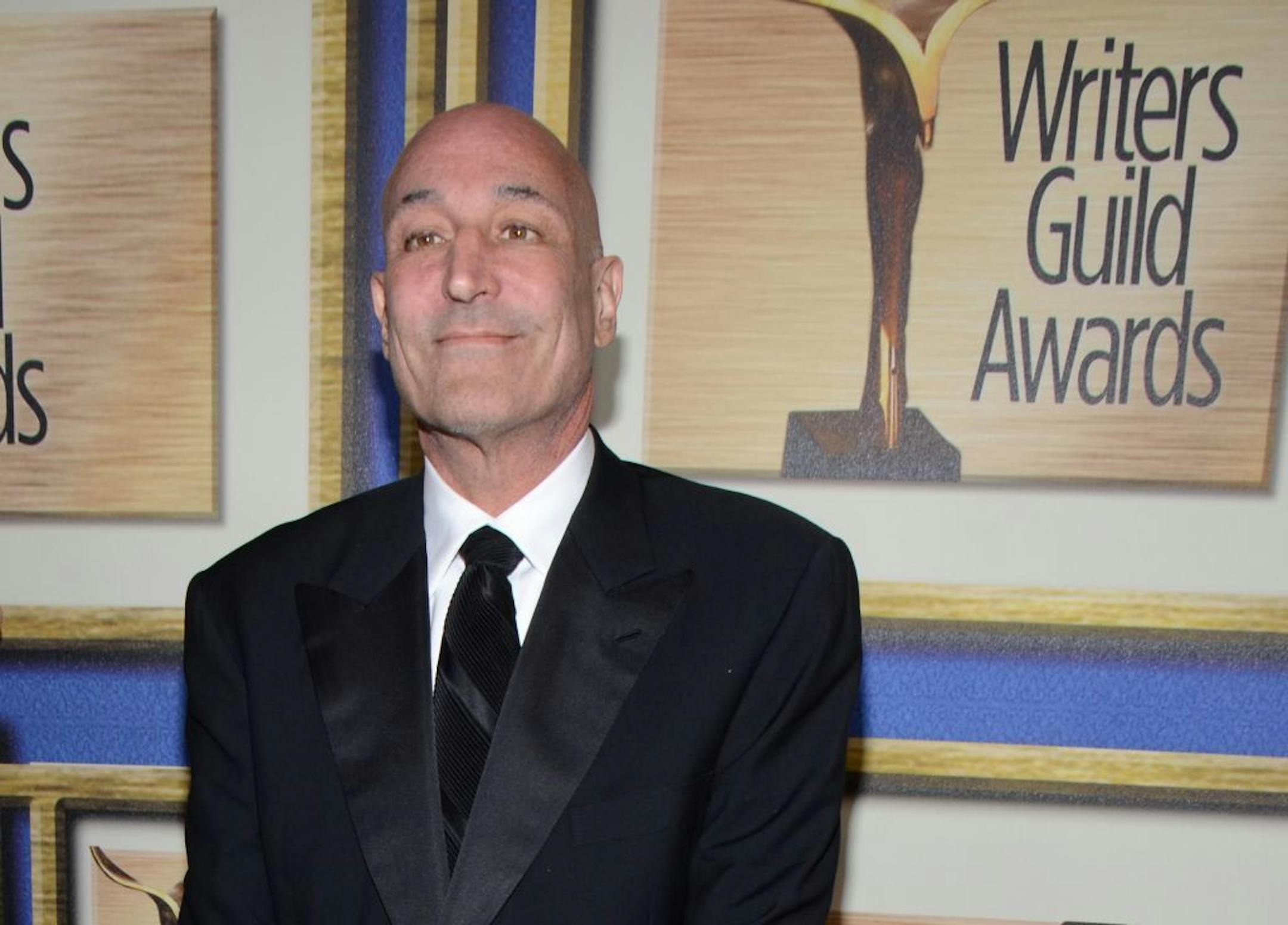 FILE - In this Feb. 1, 2014 file photo, Sam Simon arrives at the Writers Guild Awards, in Los Angeles. Simon, a co-creator of "The Simpsons" who made a midlife career shift into philanthropy and channeled much of his personal fortune into social causes including animal welfare, has died Sunday, March 8, 2015, after a long bout with cancer. He was 59.