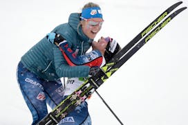 The United States' Sadie Bjornsen, left, and Afton skier Jessie Diggins celebrated after earning the bronze medal in the women's 6 x 1.3 km team sprin