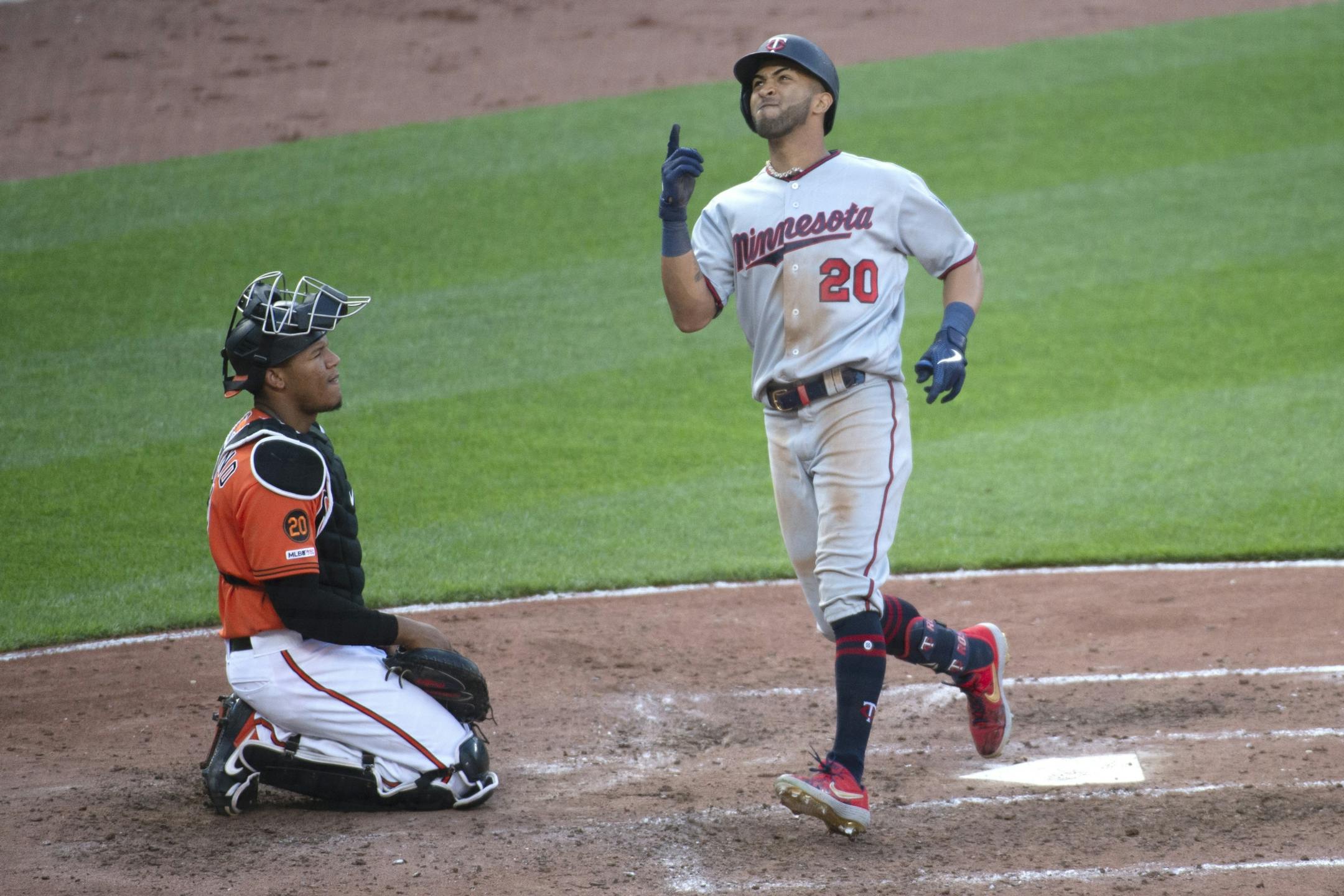 Minnesota Twins' Eddie Rosario (20) reacts after hitting a solo home run in the fifth inning of a baseball game against the Baltimore Orioles, Saturday, April 20, 2019, in Baltimore.