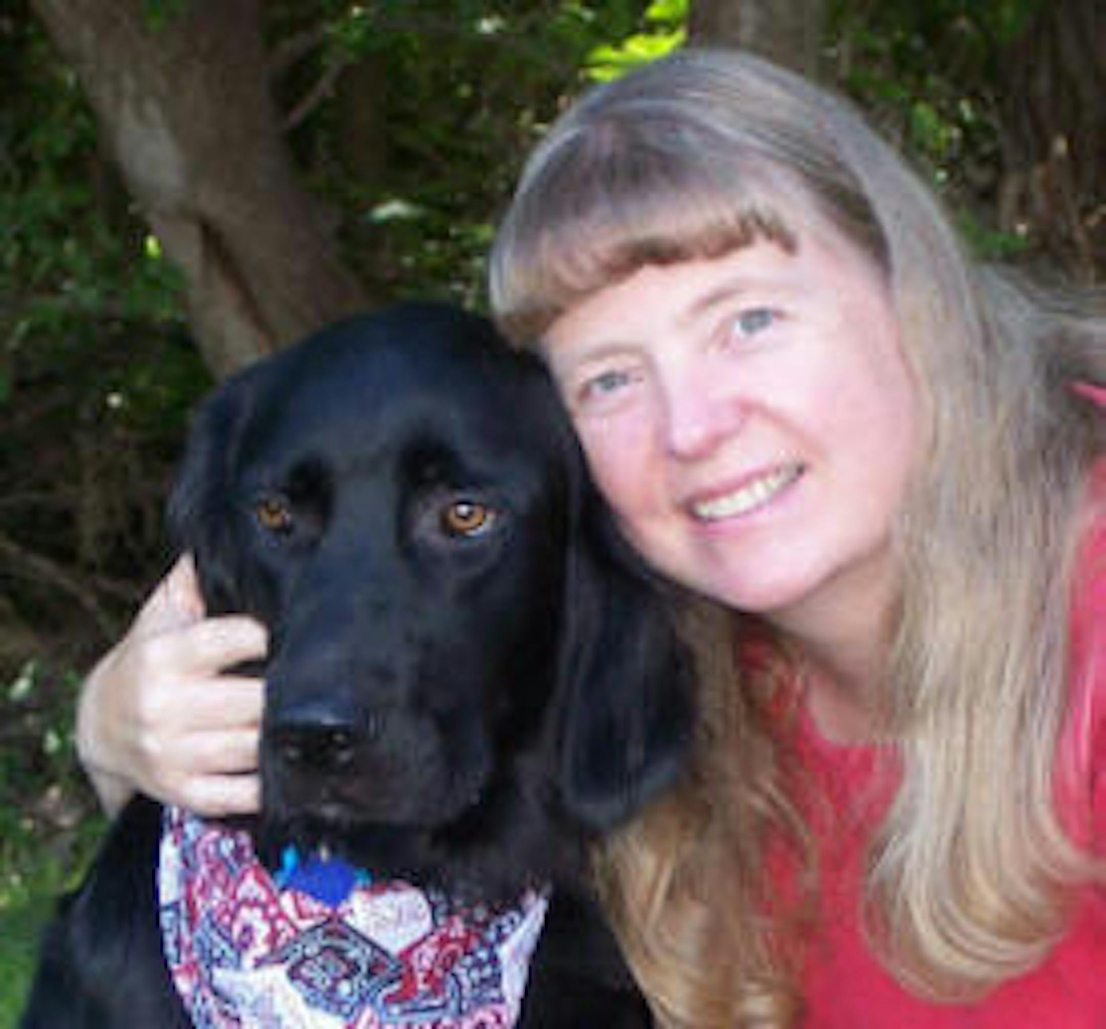 Dori Hillestad Butler and her dog, Mouse