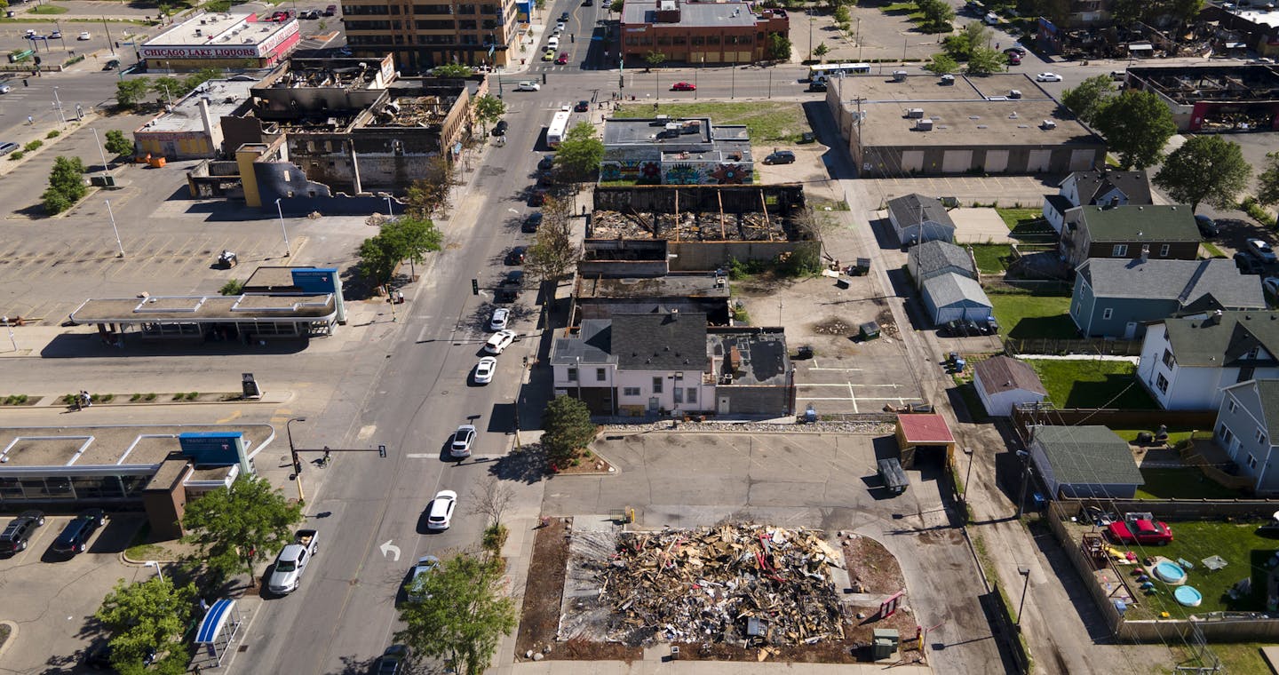 The view of destruction looking south down Chicago Avenue, toward Lake Street. Effected businesses included Popeye's Chicken, Cricket Wireless, T-Mobile, Lake Street Tobacco and more. aaron.lavinsky@startribune.com Aerial photos taken Wednesday, June 3, 2020 in the aftermath of the death of George Floyd, who was killed in police custody, in Minneapolis, Minn.