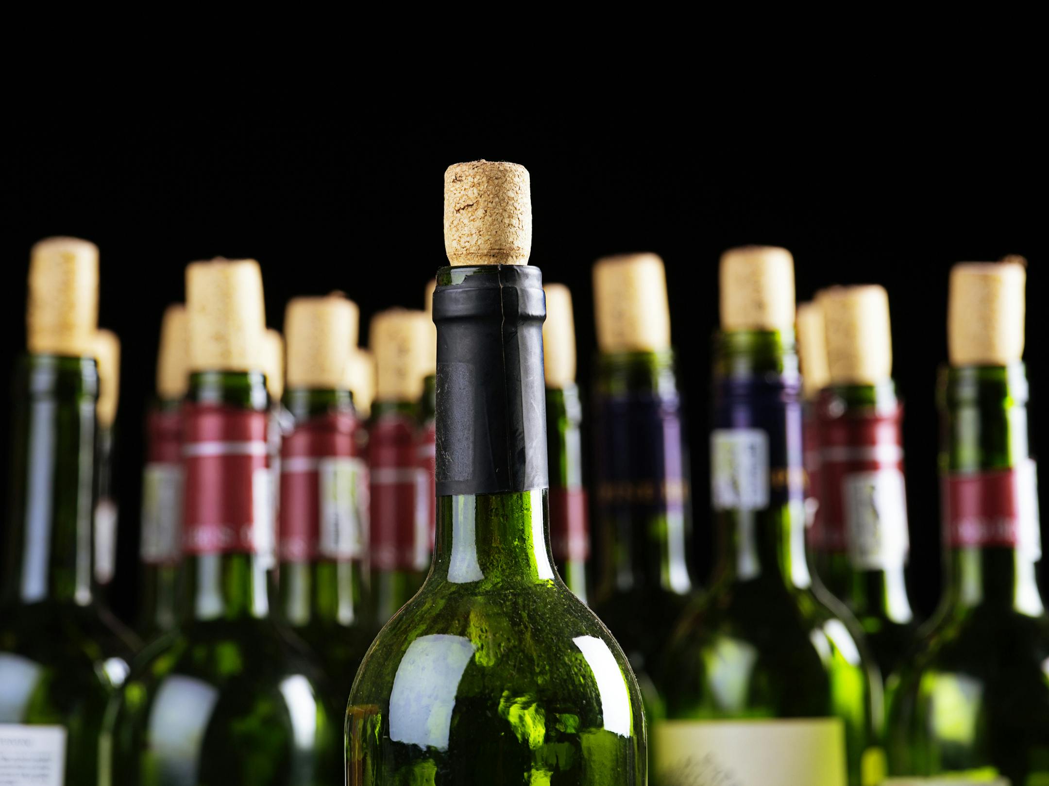 Corked wine bottles. istock