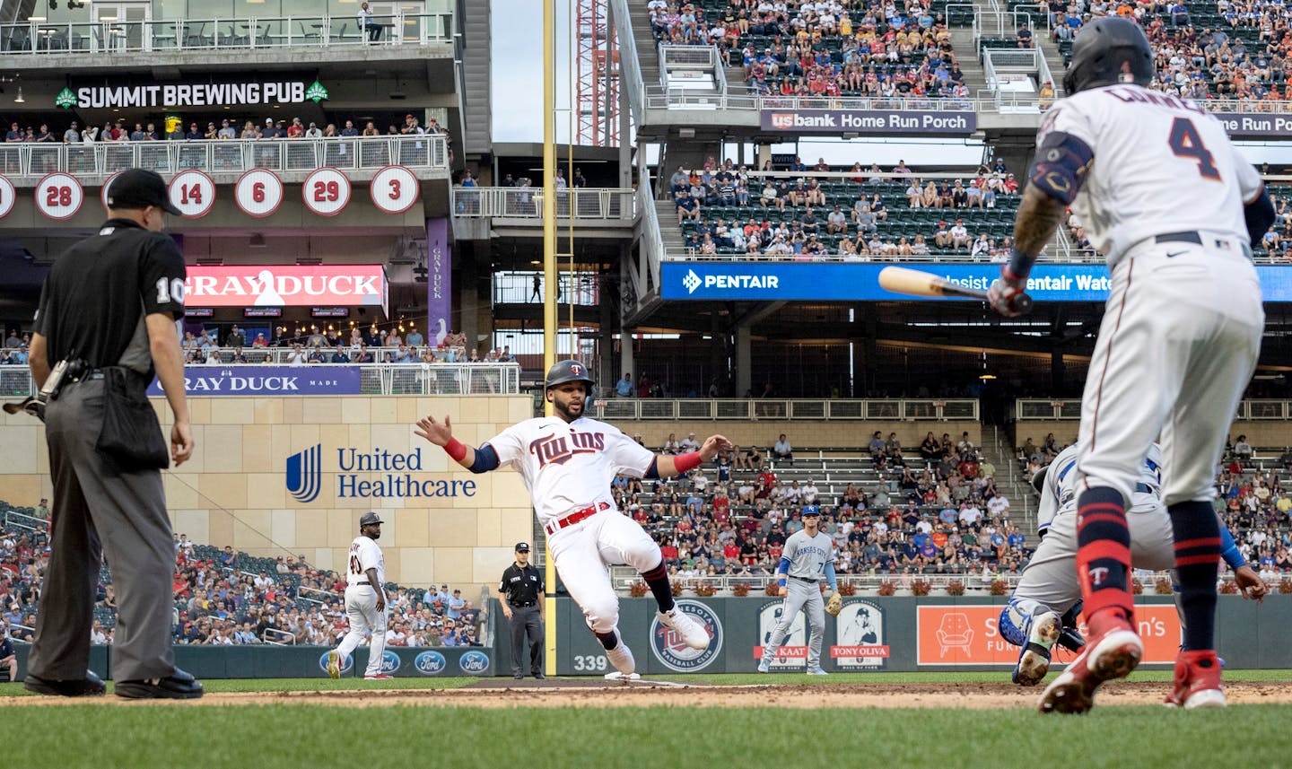 Gilberto Celestino of the Minnesota Twins slide safely into home in the second inning Tuesday, August 16, 2022, at Target Field in Minneapolis, Minn. ] CARLOS GONZALEZ • carlos.gonzalez@startribune.com