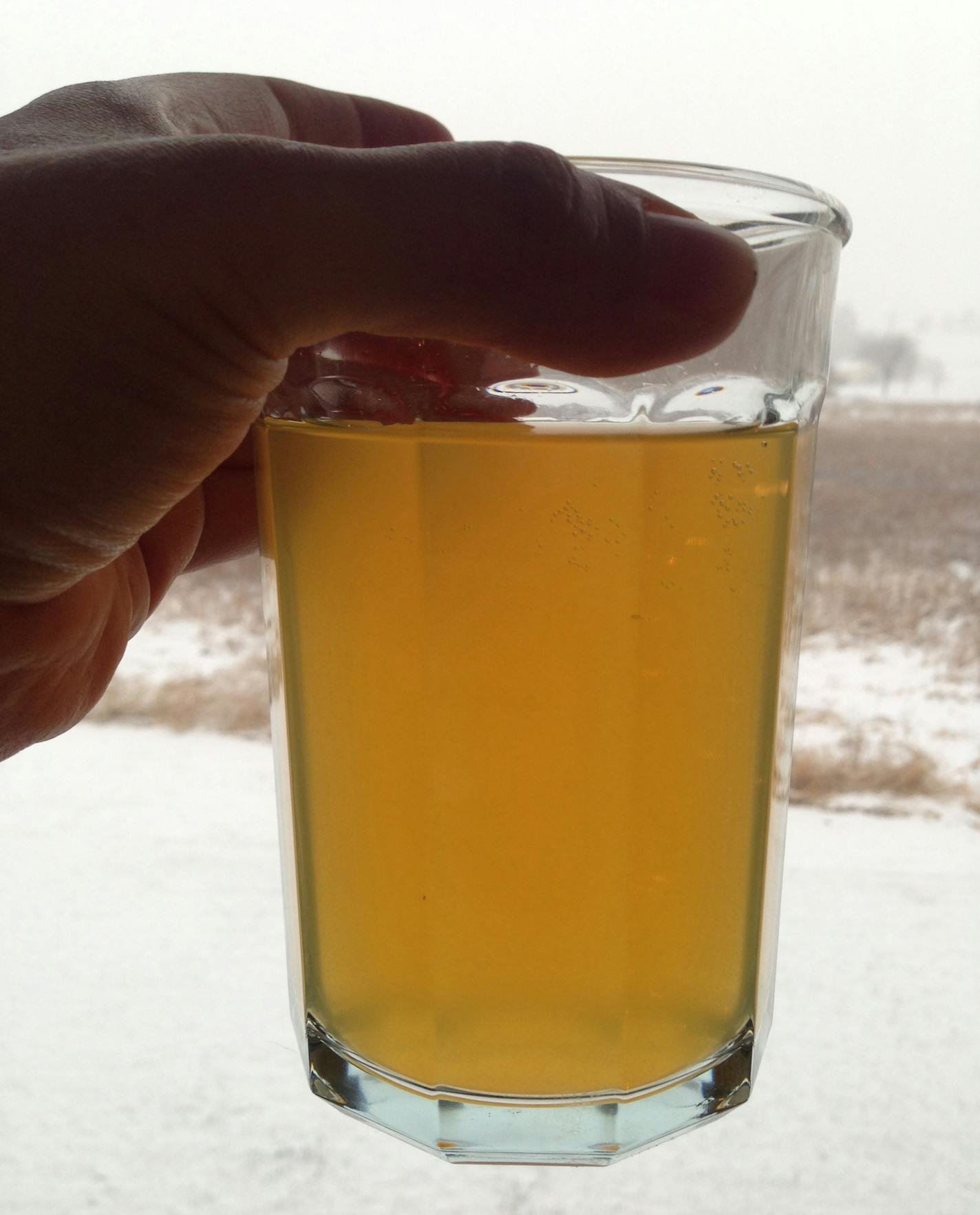 Photo by Crystal Jensen Photos of orange water in Minnetrista, taken on Dec. 3, 2014 when the city flushed its water pipes in some neighborhoods without advance warning. Residents have also complained about discolored water at other times not related to flushing.