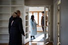 Libby Jacobson and Kyle Staunton walk through their new house with real estate agent Kathy Borys, left, in St. Anthony, the third-hottest city in the 