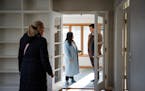 Libby Jacobson and Kyle Staunton walk through their new house with real estate agent Kathy Borys, left, in St. Anthony, the third-hottest city in the 