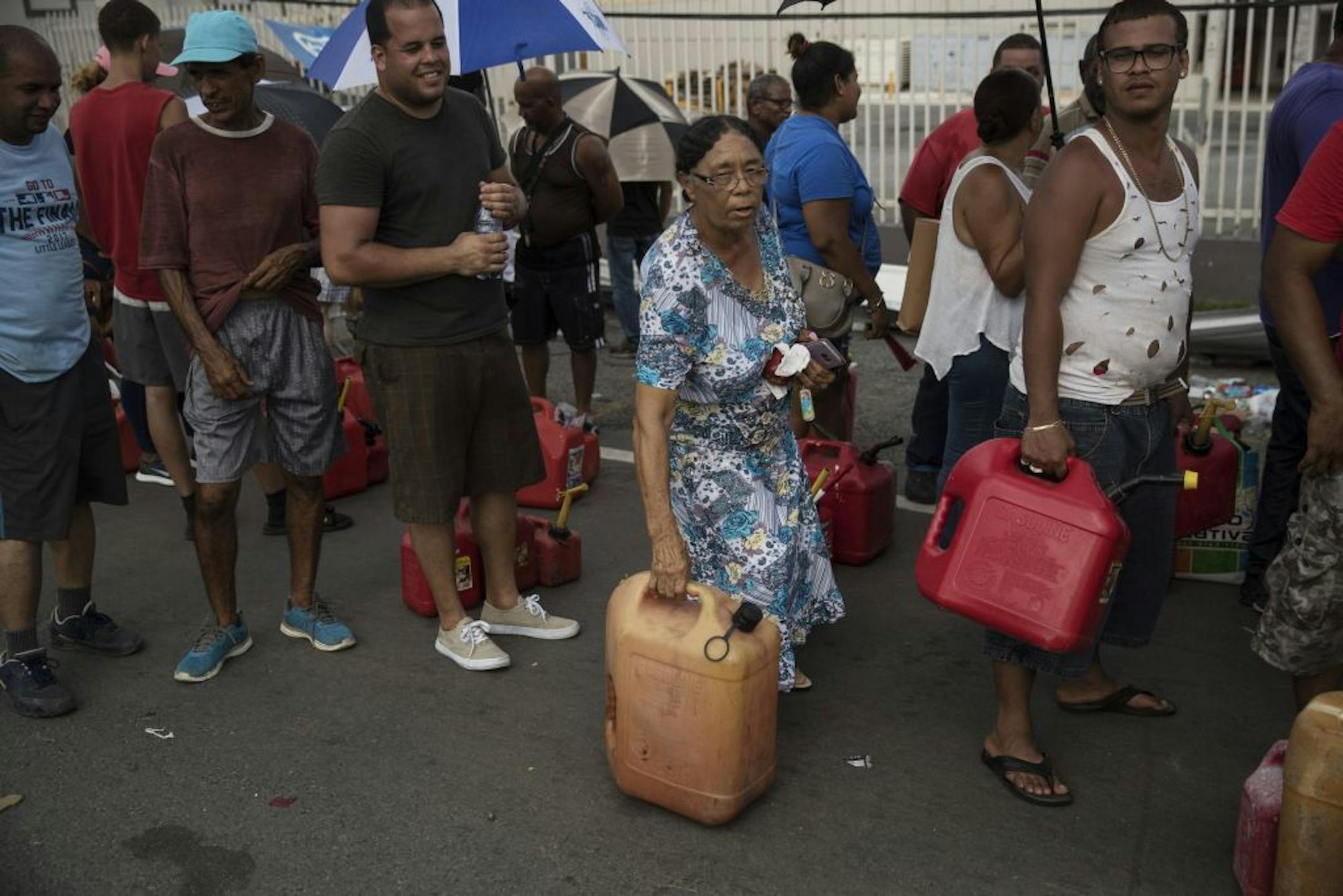 People line up to buy gas at a station in Humacao, Puerto Rico, several days after Hurricane Maria caused widespread damage, Sept. 24, 2017. Facing mounting evidence that Puerto Rico has vastly undercounted the number of people who died because of Maria, Gov. Ricardo A. Rossell— ordered on Dec. 18 that every death on the island since the calamitous storm be reviewed.
