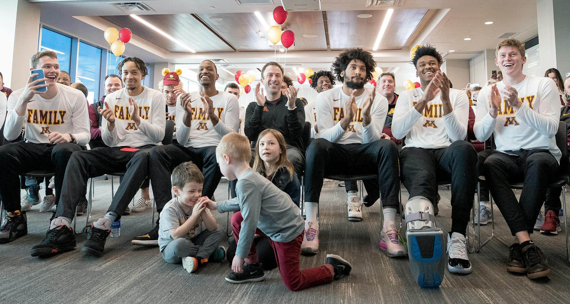 Minnesota Gophers coach Richard Pitino and Gophers players reacted after they received a 10 seed in NCAA tournament to play Louisville, during a selection show on March 17, 2019.