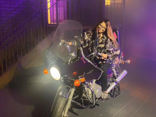 Tyka Nelson sits on one of Prince's motorcycles