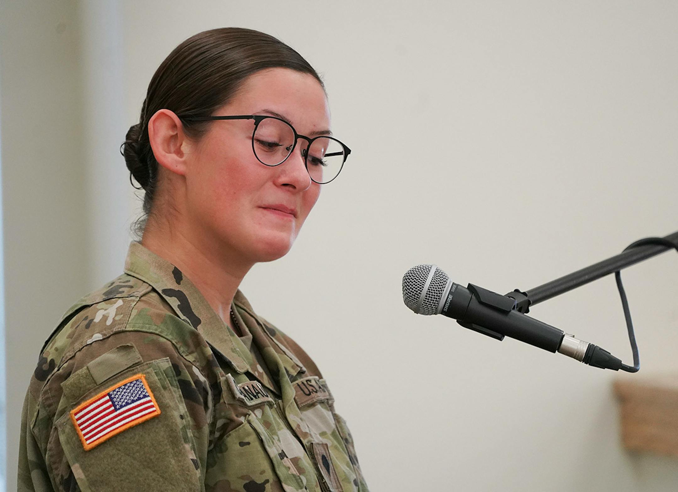 Spc. Nicole Cavanaugh fought back tears as she spoke about her friend Sgt. Kort M. Plantenberg during a memorial ceremony in North Fort Hood.