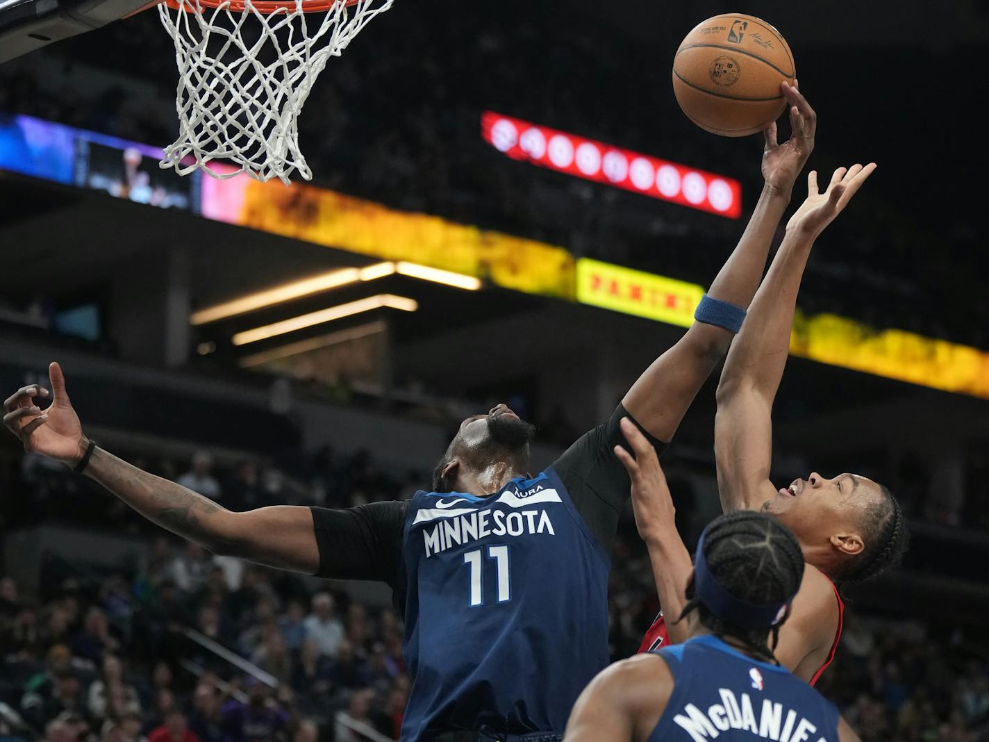 Minnesota Timberwolves center Naz Reid (11) defends against Toronto Raptors forward Scottie Barnes (4) in Minneapolis, Minn., on Thursday, Jan. 19, 2023. Timberwolves take on the Raptors at Target Center. ] RICHARD TSONG-TAATARII • richard.tsong-taatarii @startribune.com