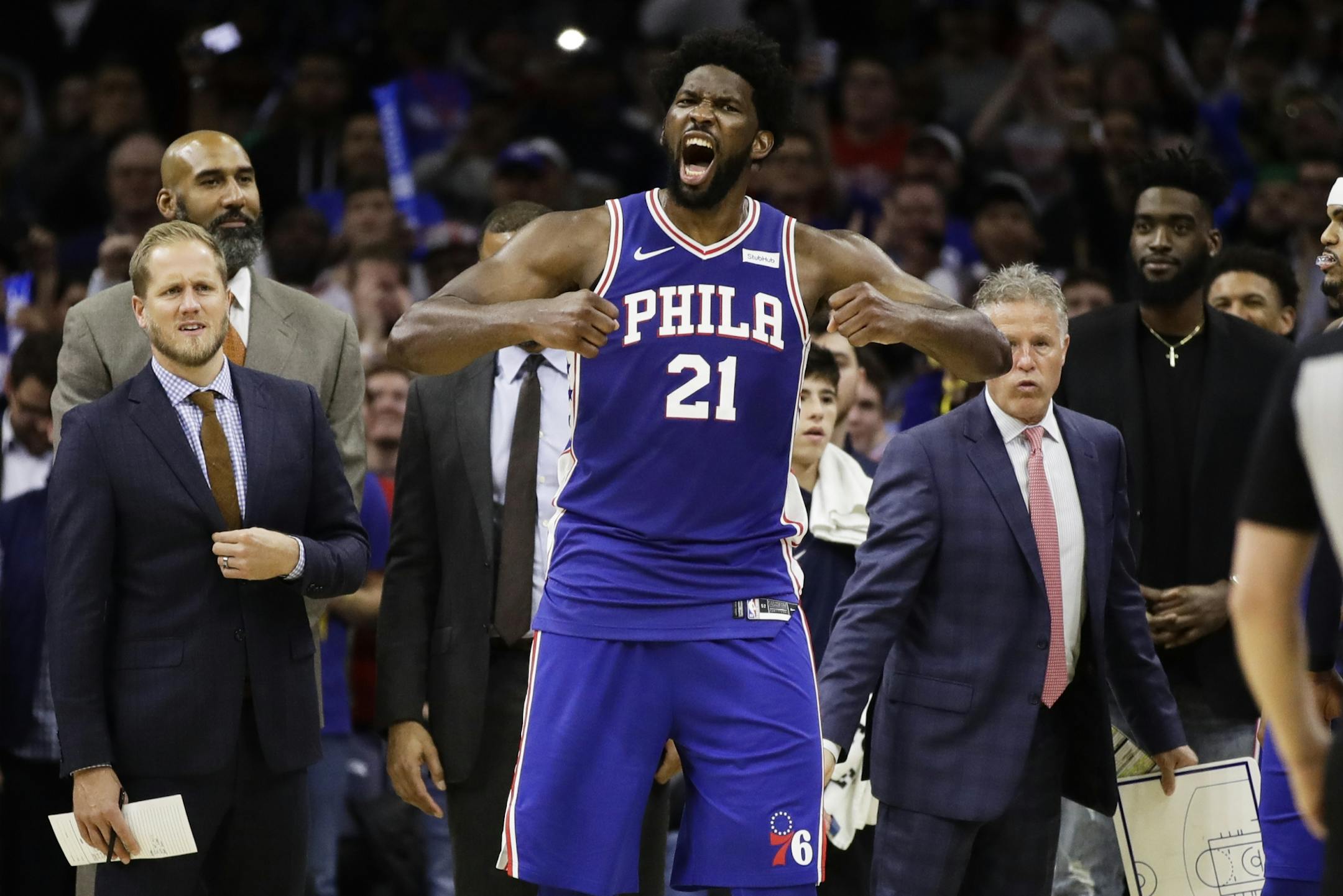 Philadelphia 76ers' Joel Embiid reacts after it was announced that he and Minnesota Timberwolves' Karl-Anthony Towns were ejected, during the second half of an NBA basketball game Wednesday, Oct. 30, 2019, in Philadelphia. The 76ers won 117-95.