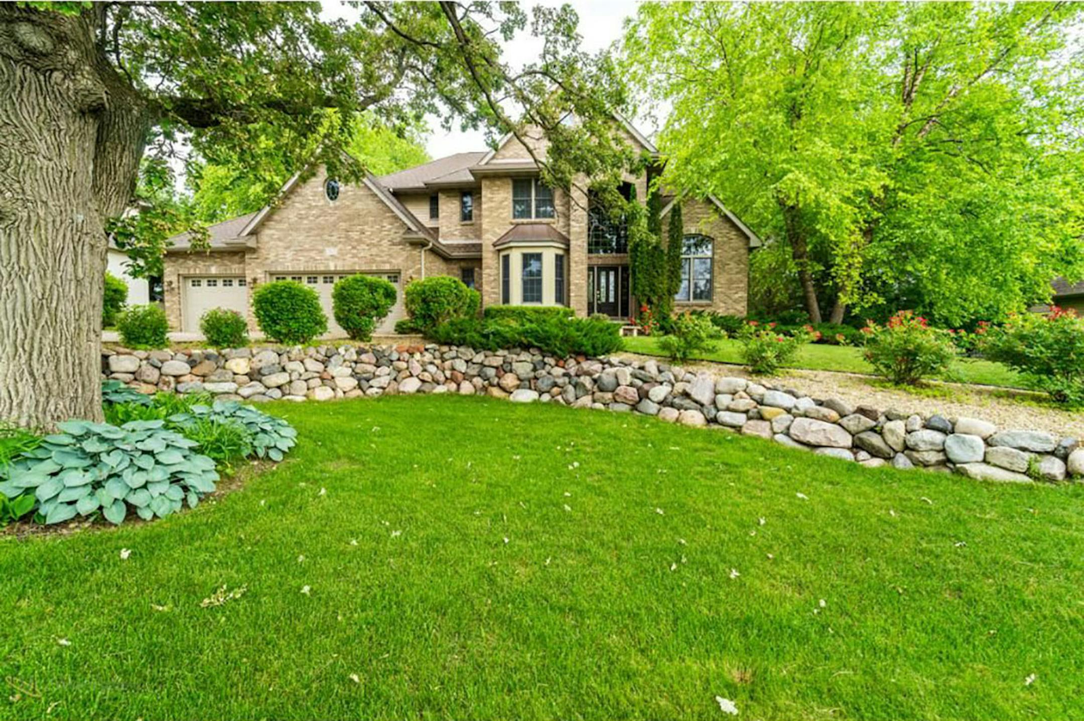 Lino Lakes
Built in 1996, this four-bedroom, four-bath house has 3,905 square feet and features four bedrooms on one level, curved stairway, two fireplaces, hardwood floors, eat-in kitchen with granite countertops, full finished walkout basement, two paver patios and deck. Listed by Carol Pech, Counselor Realty Inc., 612-720-2000.