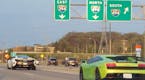 A traveler eastbound on Hwy 394/Hwy 12 snapped pictures of some of the sports cars that were racing in the west metro on April 23, 2016.