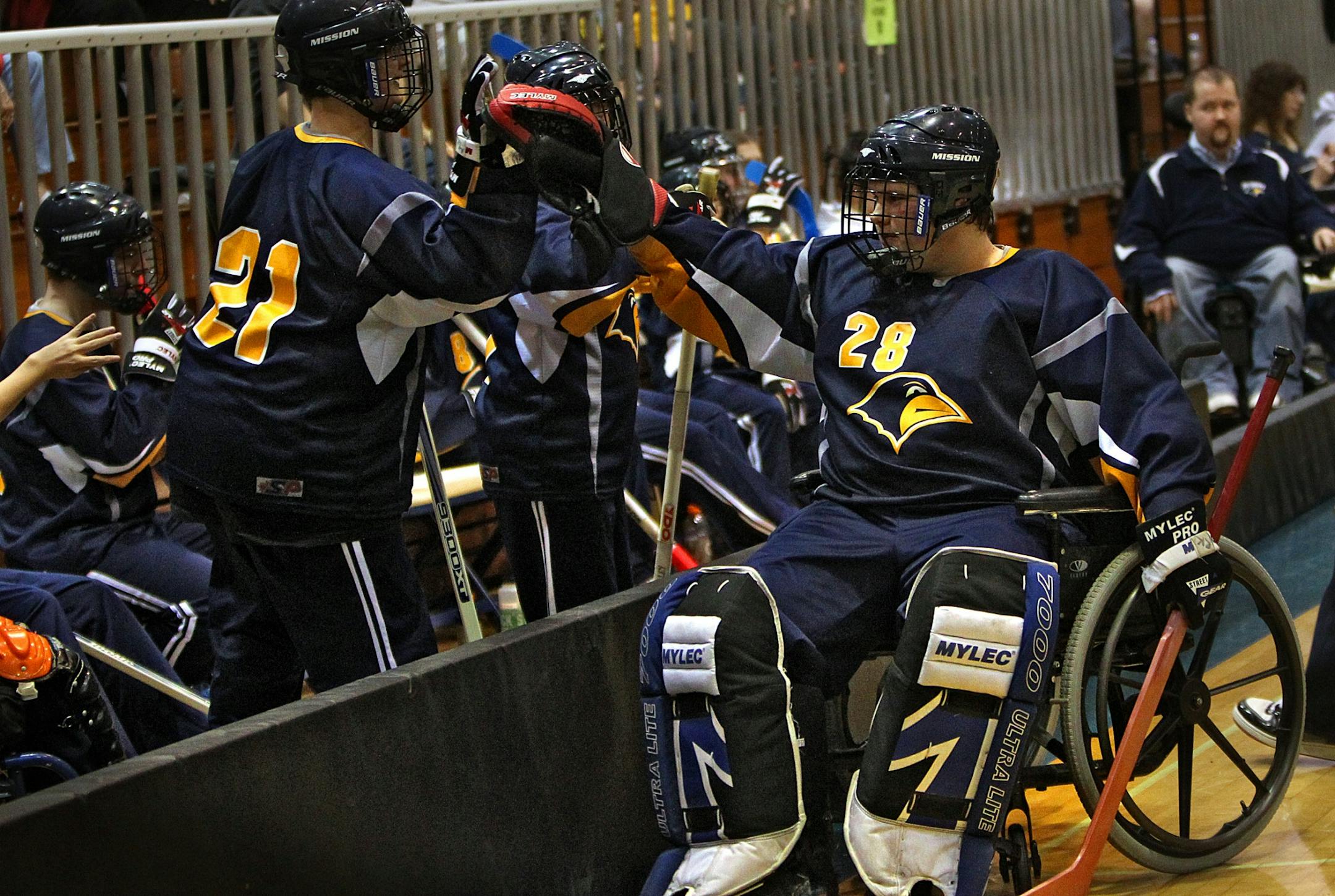 Robbinsdale goalie Charlie Wittmer was congratulated by teammates on the bench during a time out, after he had made a big save in the game.