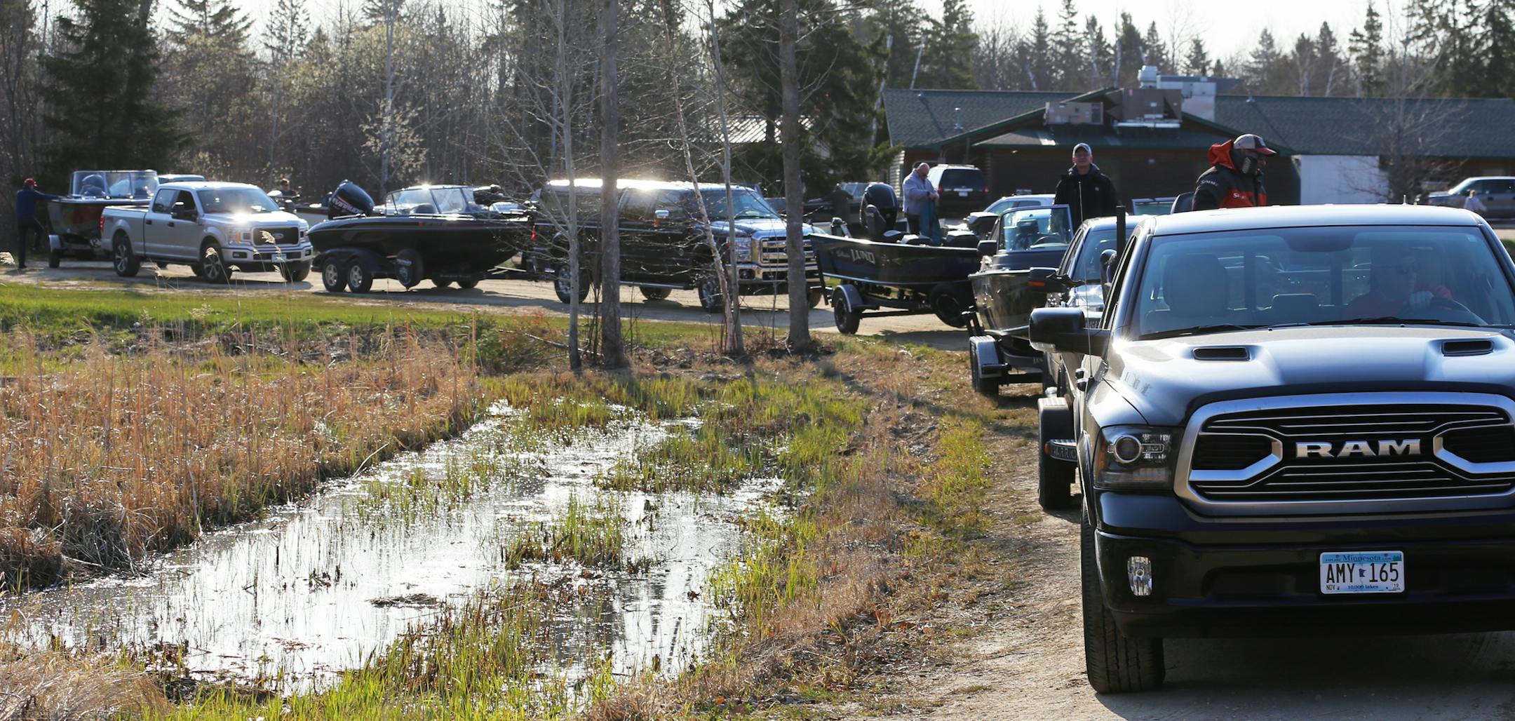 Take a number: Pickups and their owners waited in line Saturday morning to launch their boats on Upper Red Lake. A stout southerly wind made angling challenging, but many four-walleye limits were recorded.